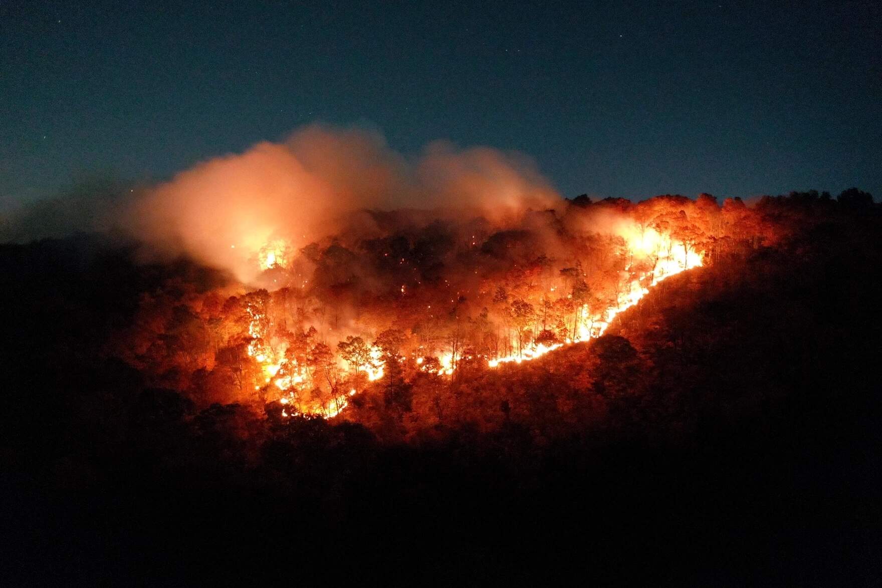 A brush fire on Lamentation Mountain in Berlin, the night of October 21, 2024. (Greg Balicki via Connecticut Public)
