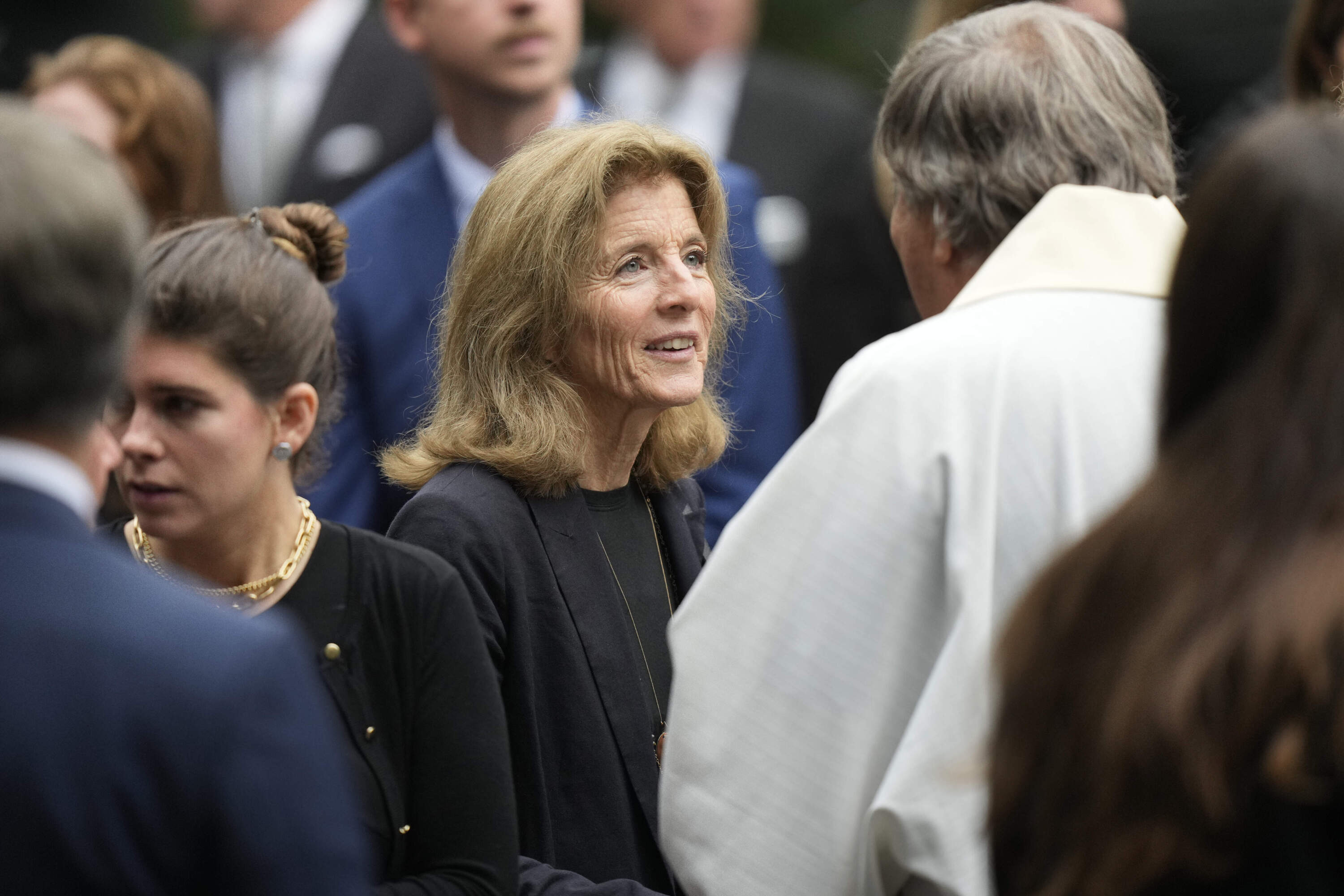 Caroline Kennedy, center, daughter of Pres. John F. Kennedy, speaks with people as she departs Our Lady of Victory church following funeral services for Ethel Kennedy. (Steven Senne/AP)