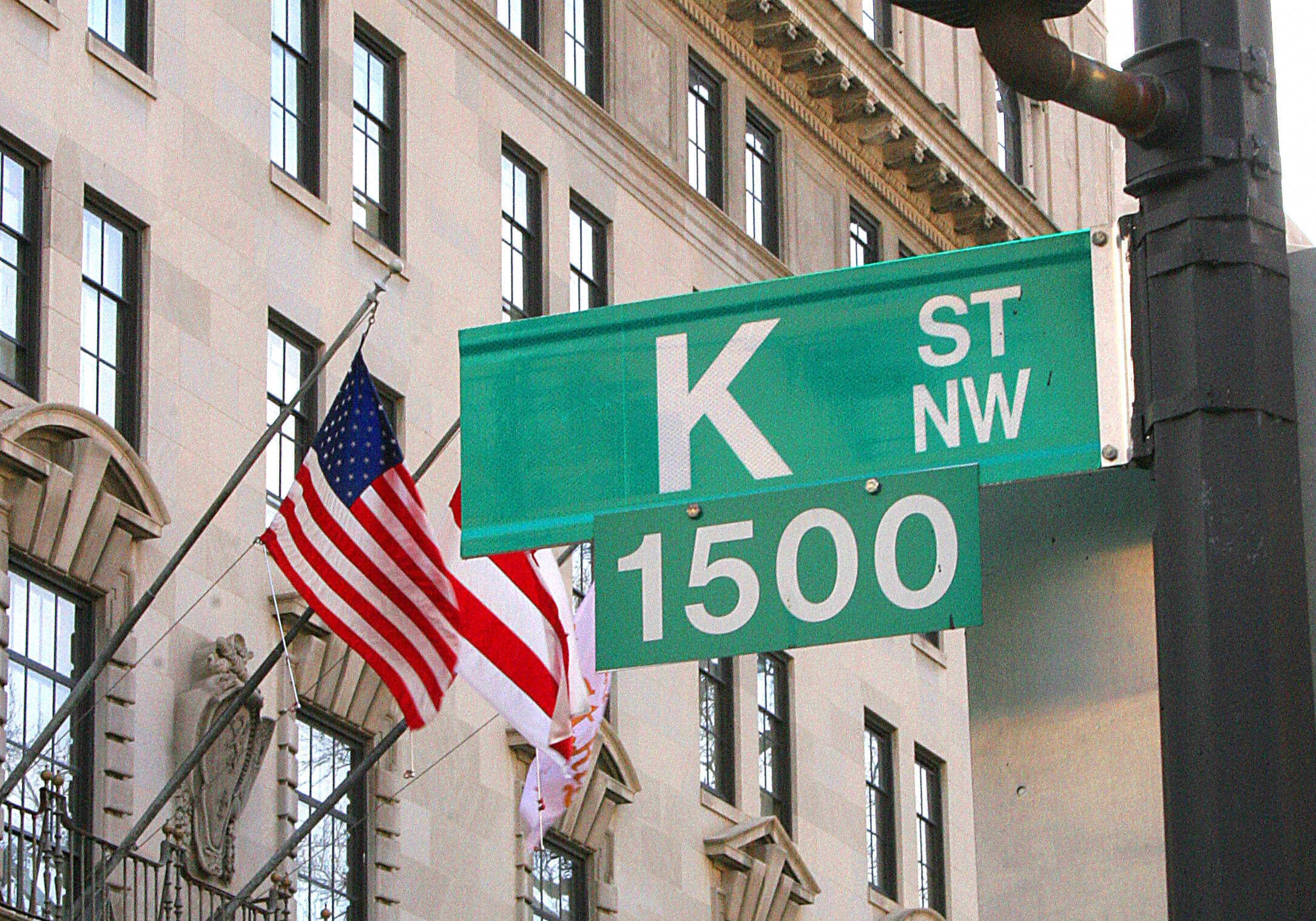 A sign showing K Street is shown in Washington,D.C. A stone's throw from the White House, K Street is an alternative corridor of power in US politics, packed with thick carpeted offices and lobbyists with even deeper pockets.(Karen Bleier/AFP via Getty Images)