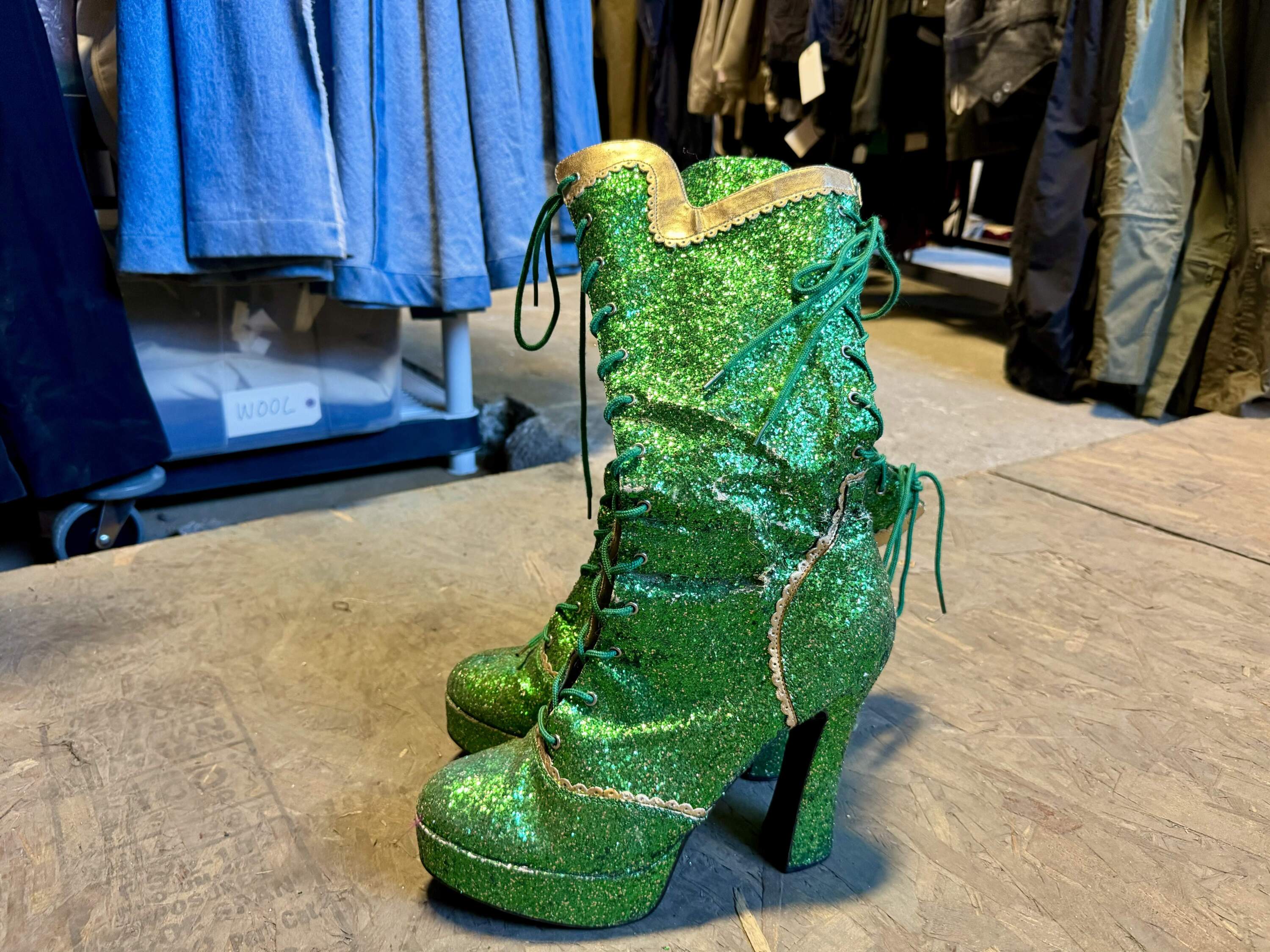 Actor and playwright Taylor Mac’s platform green boots worn in “The Lily’s Revenge.” (Maddie Browning/WBUR)