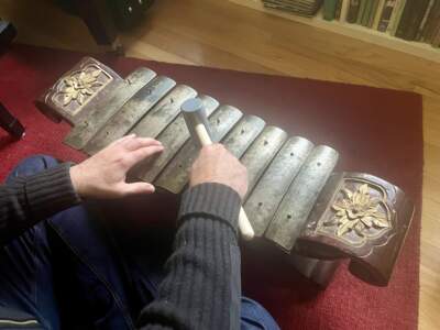 Eric Shimelonis plays a saron from the collection of Asia Barong in Great Barrington, Massachusetts. (courtesy of Rebecca Sheir)
