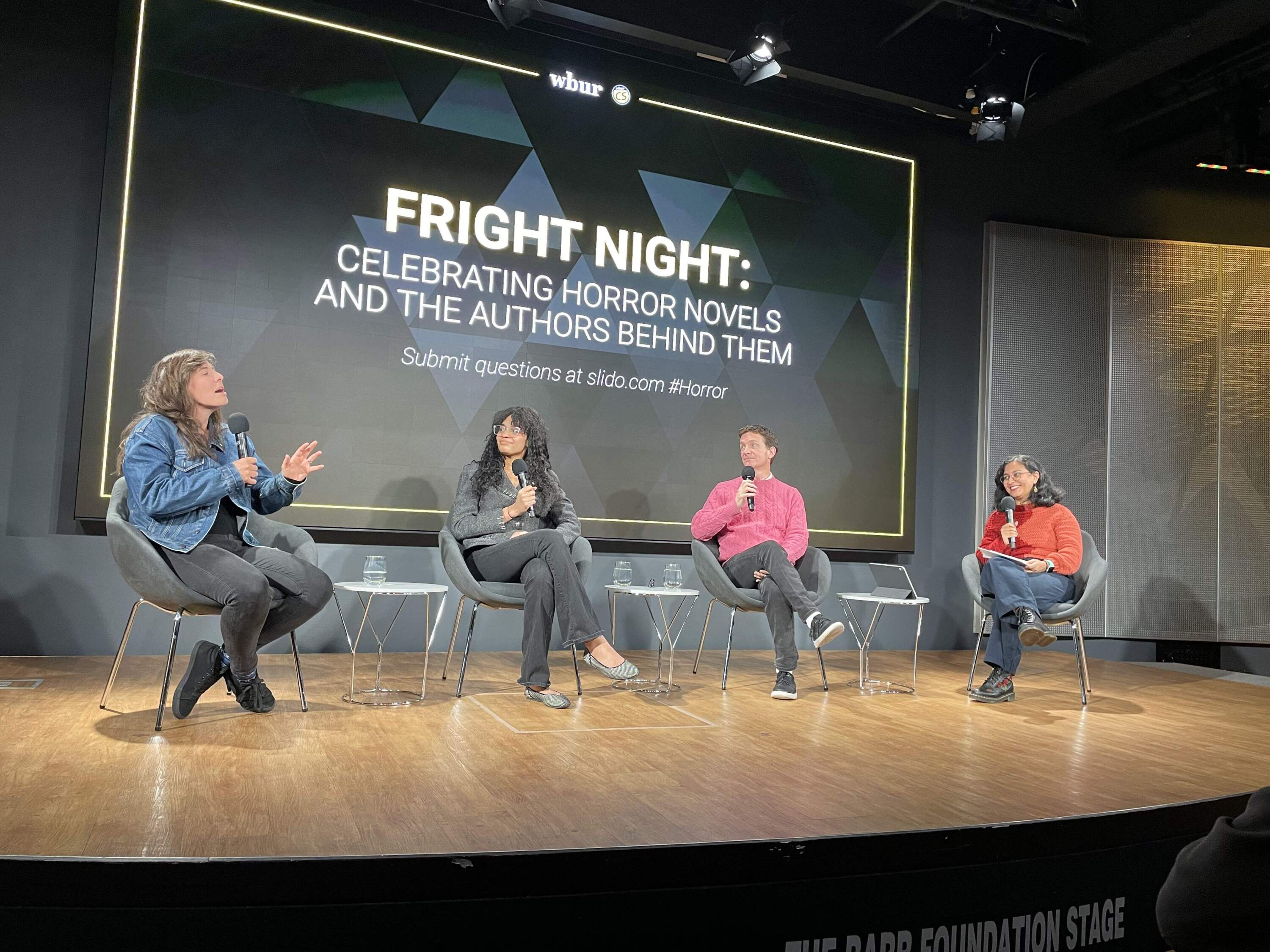 (From left to right) Alix E. Harrow, Alexis Henderson and Grady Hendrix speak with Here & Now's Kalyani Saxena. (Courtesy of Kalyani Saxena)