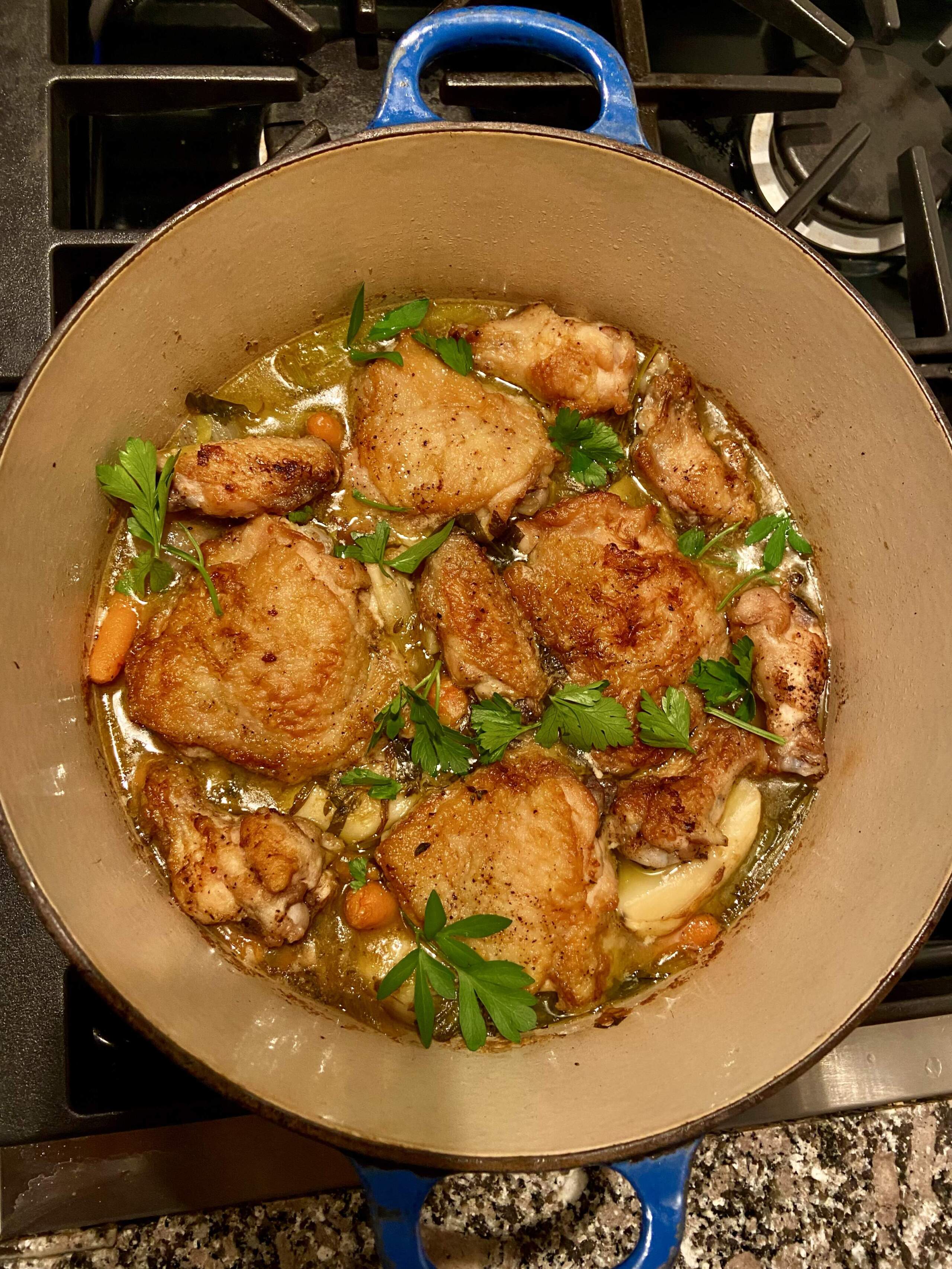 Chicken braised in apple cider with leeks, onions and potatoes. (Kathy Gunst/Here & Now)