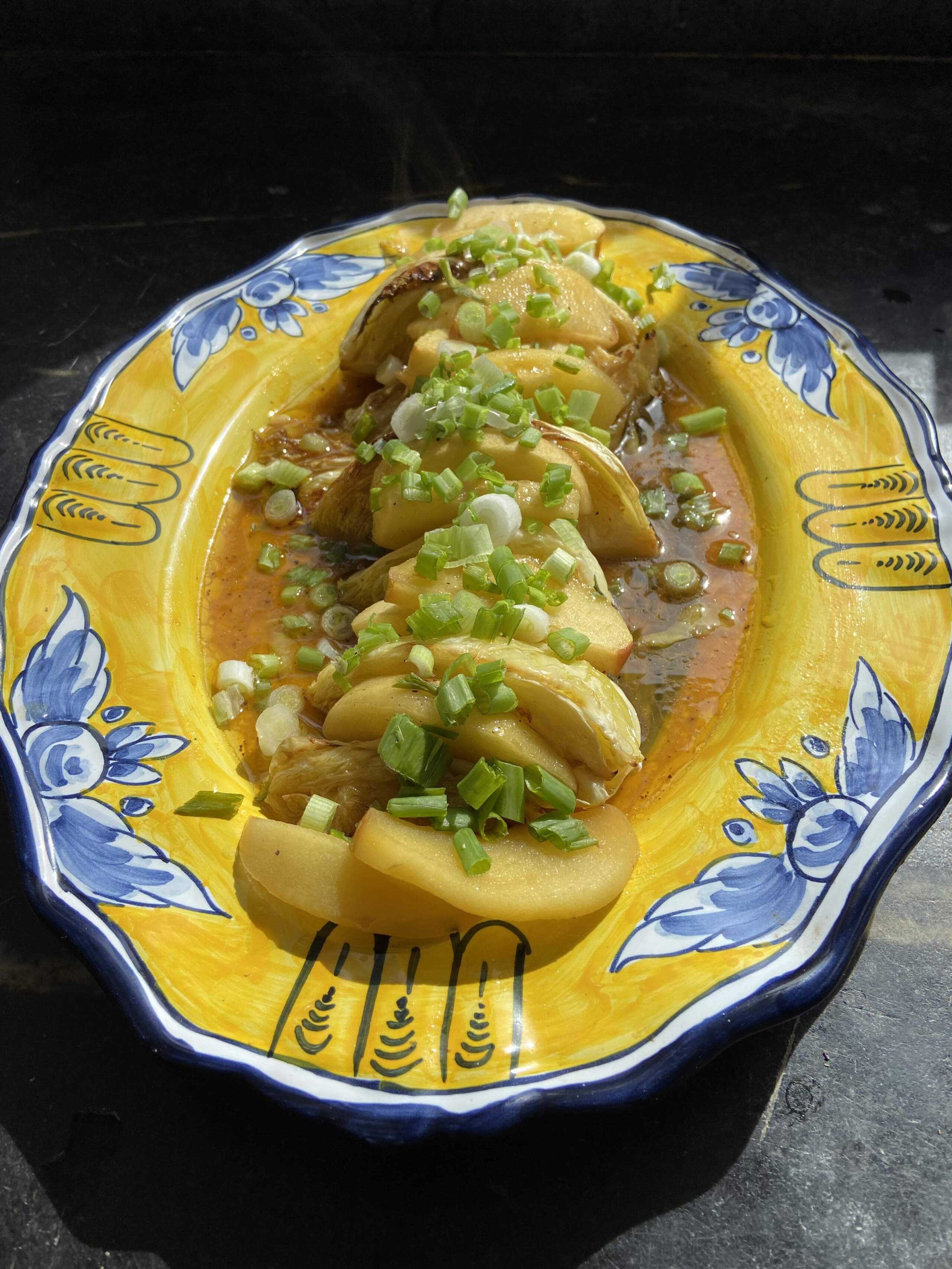 Roasted cabbage and apples with apple cider dressing. (Kathy Gunst/Here & Now)