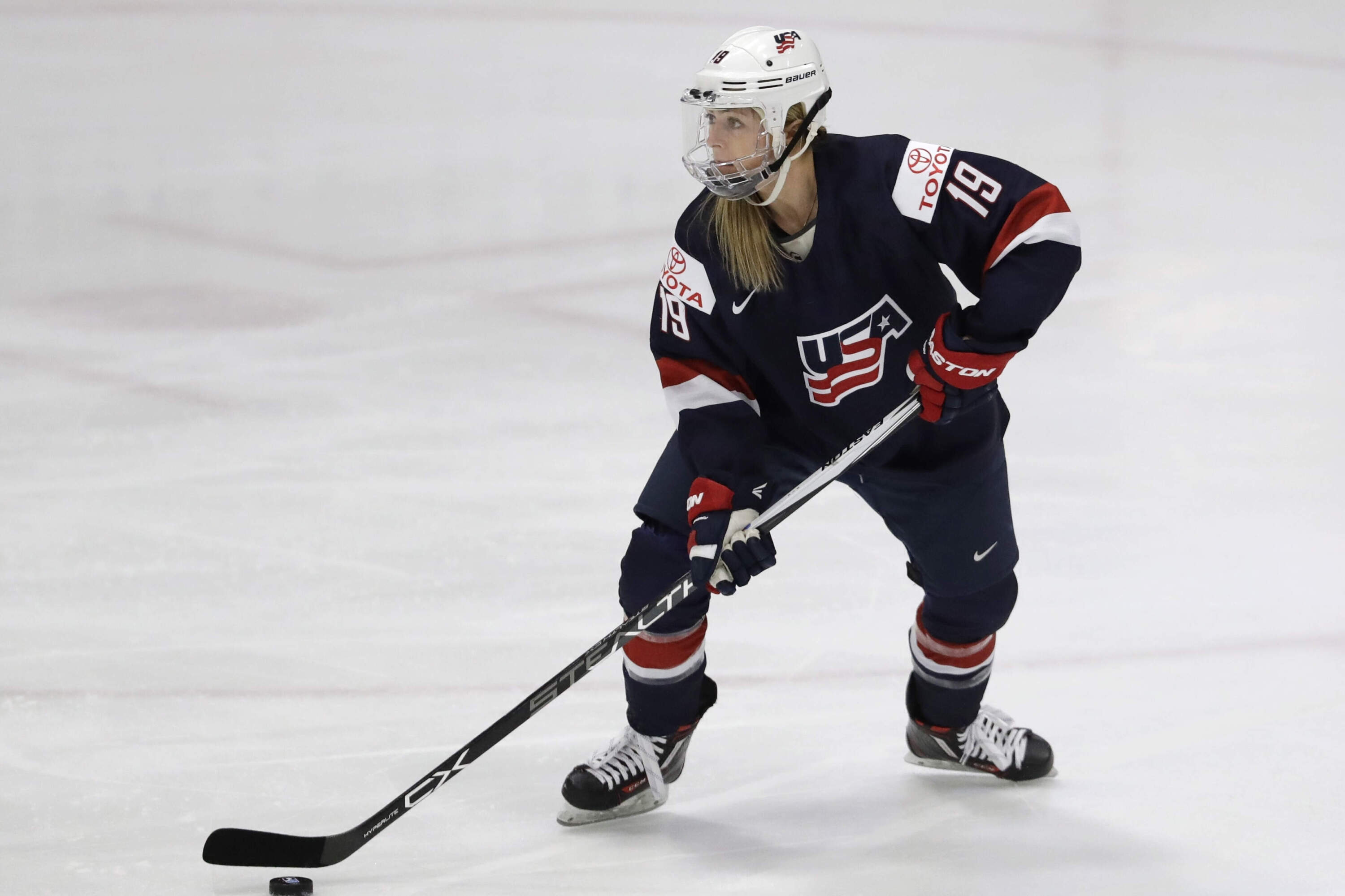 United States forward Gigi Marvin controls the puck during the first period of a IIHF Women's World Championship semifinal hockey tournament game against Germany, Thursday, April 6, 2017, in Plymouth, Mich. (Carlos Osorio/AP)