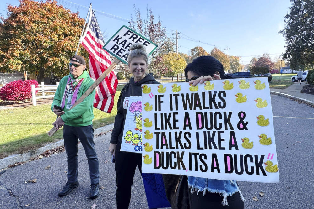 Supporters of Richard Schiffer Jr. stand outside Stoughton District Court ahead of Schiffer's arraignment. (Michael Casey/AP)