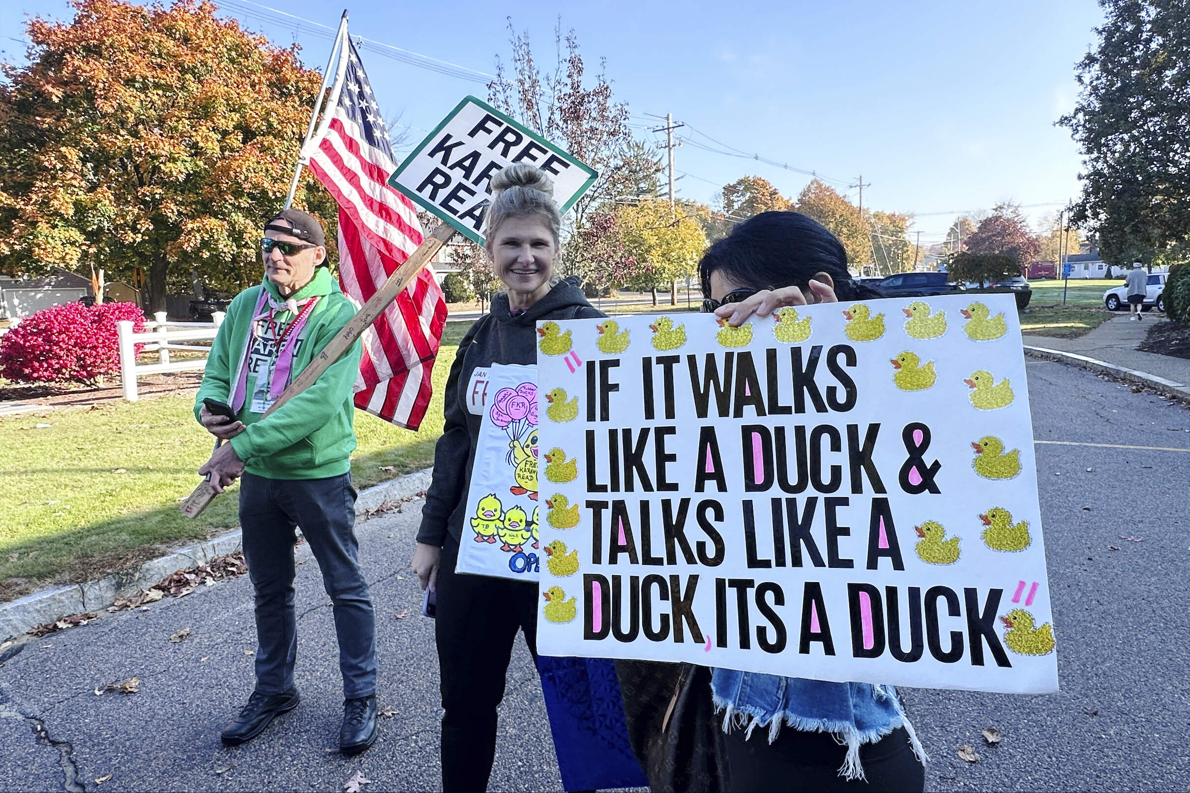 Supporters of Richard Schiffer Jr. stand outside Stoughton District Court before Schiffer's arraignment. (Michael Casey/AP)