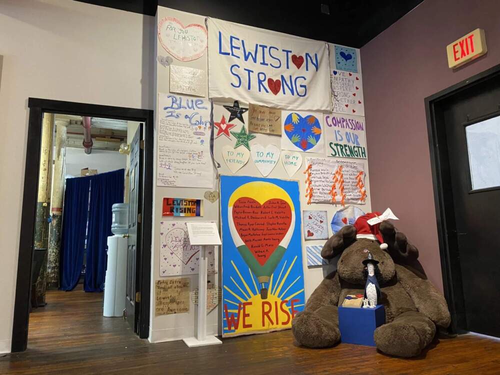 A collection of items left in makeshift memorials last year is now on display at MAINE MILL in Lewiston, pictured here Oct. 18, 2024. (Ari Snyder/Maine Public)