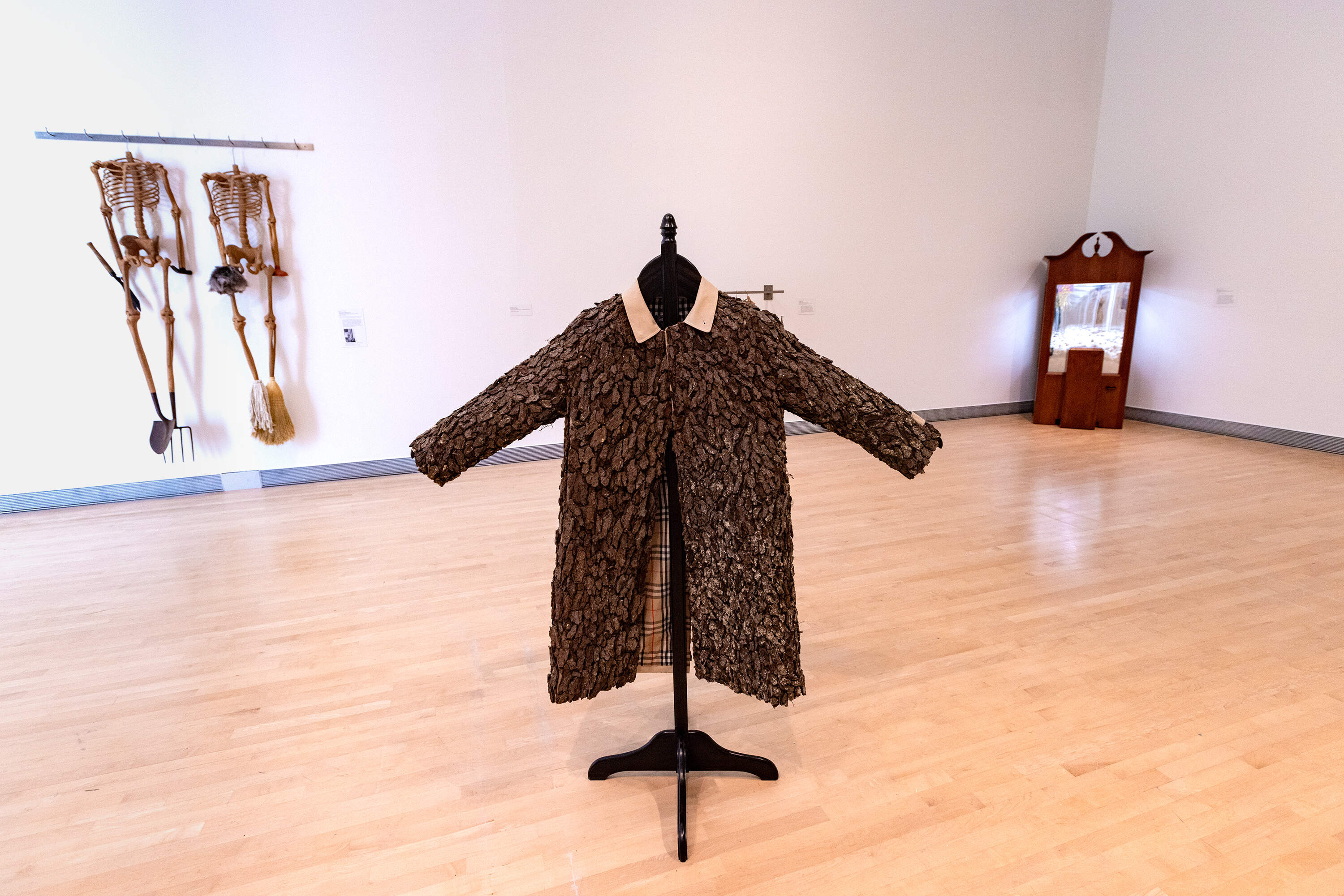 In front, “Scarecrow,” and in the background “American Gothic” and “High Cotton” by Hugh Hayden. (Jesse Costa/WBUR)