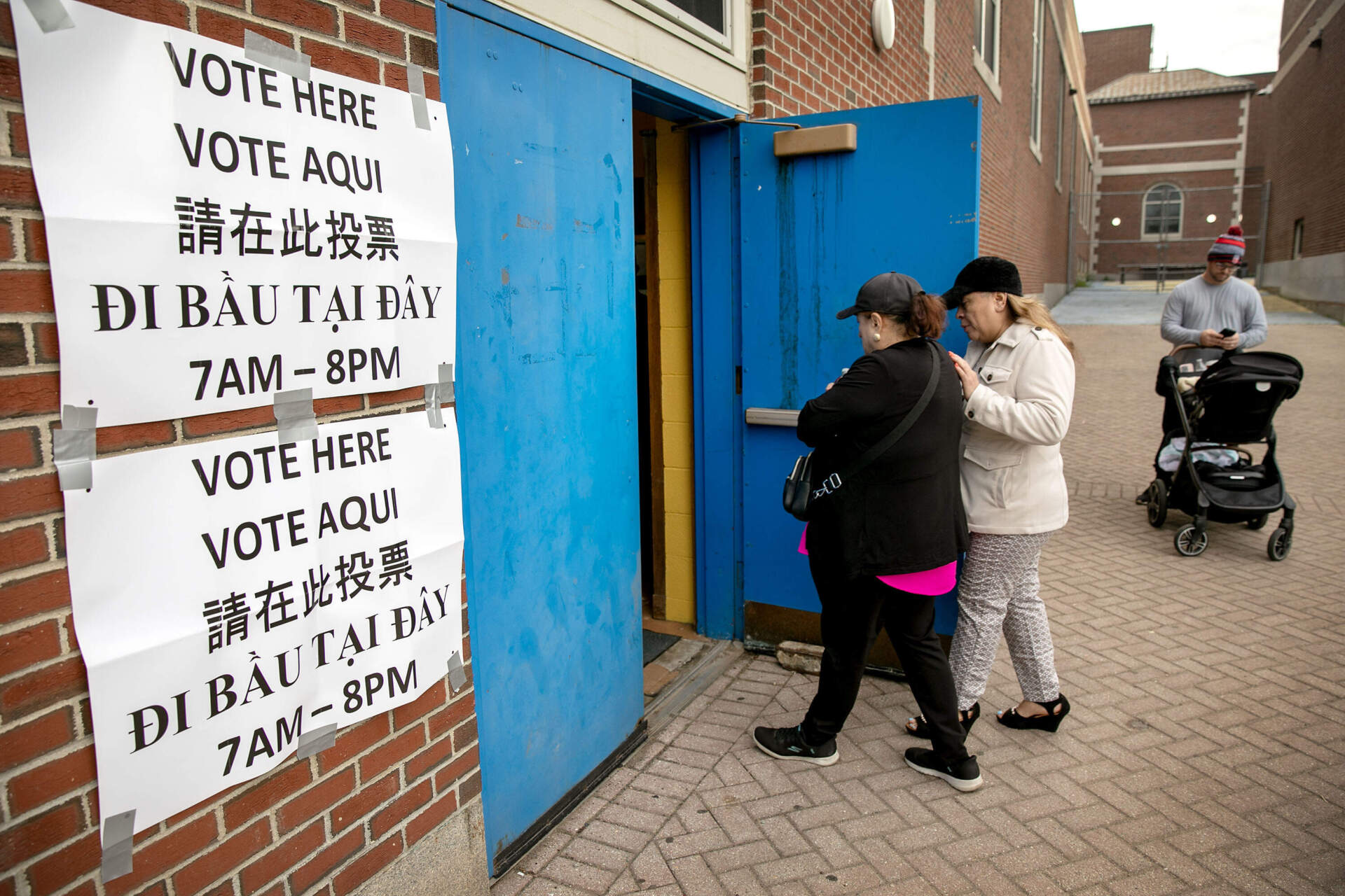 Voters enter East Boston High School on Election Day. (Robin Lubbock/WBUR)