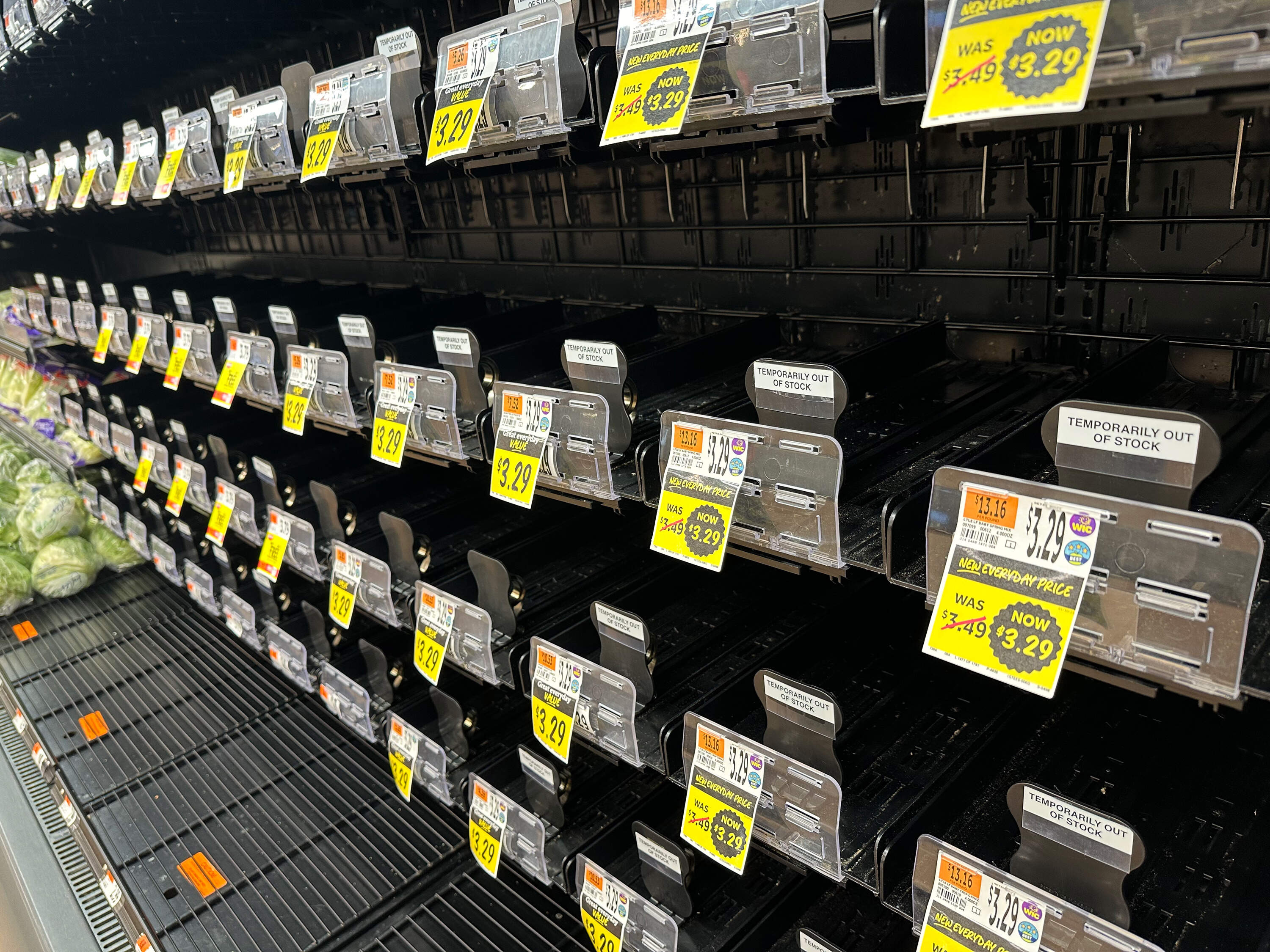 Shelves and bins are empty in the produce department at Stop and Shop in Somerville, due to what the store claims is a systems issue which is impacting shipments of certain products. (Jesse Costa/WBUR)
