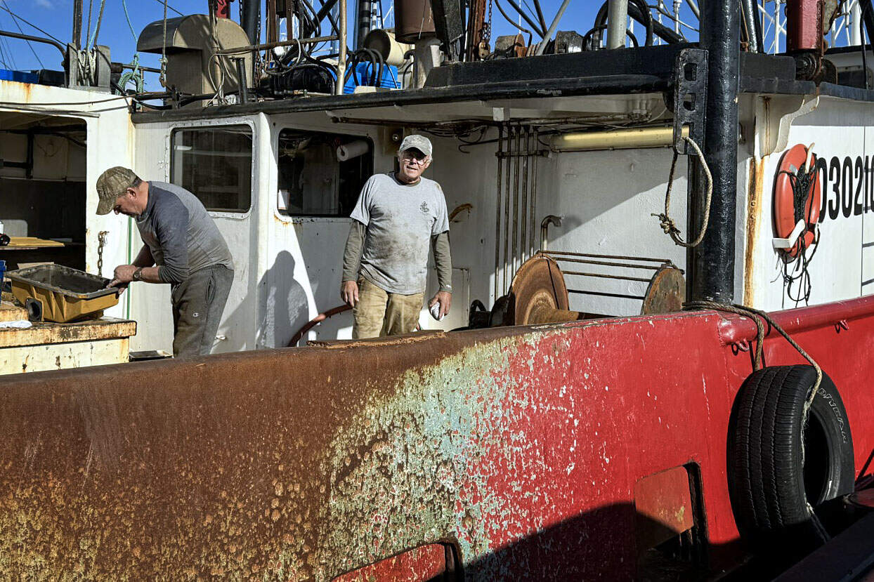 Tony Alvernaz, who co-owns a fleet of scallop boats in New Bedford, said Democrats are "all supporting wind" over the fishing industry. (Walter Wuthmann/WBUR)