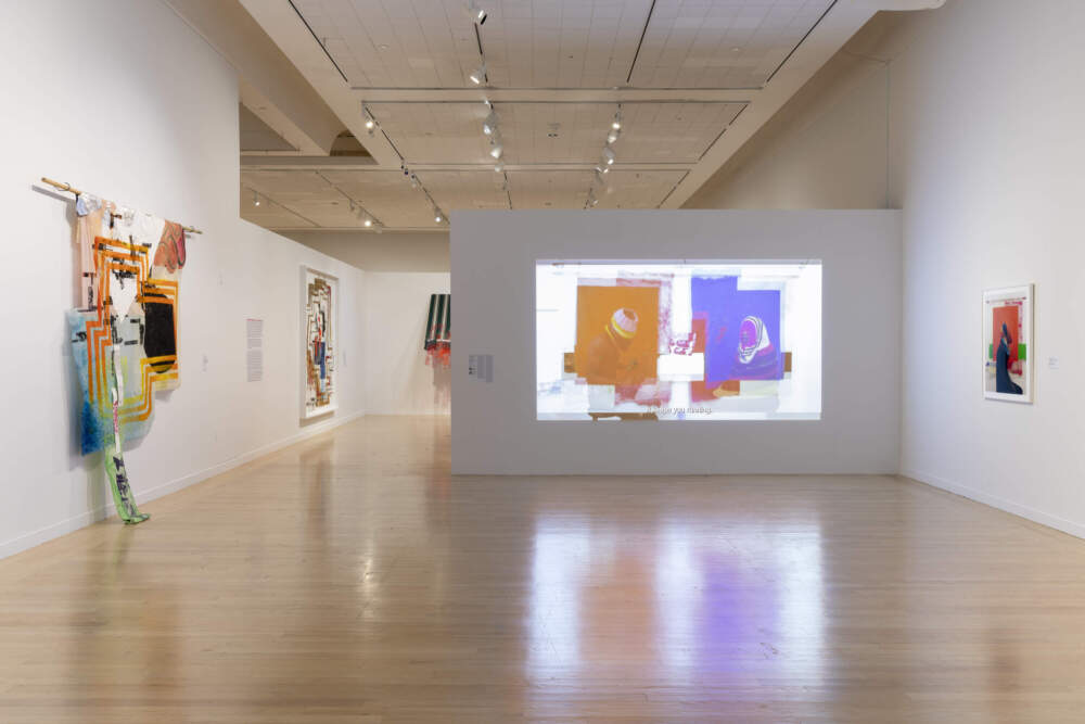 “Self Portrait: Tale of Two Michaels" is projected onto a wall as visitors enter "Tomashi Jackson: Across The Universe"