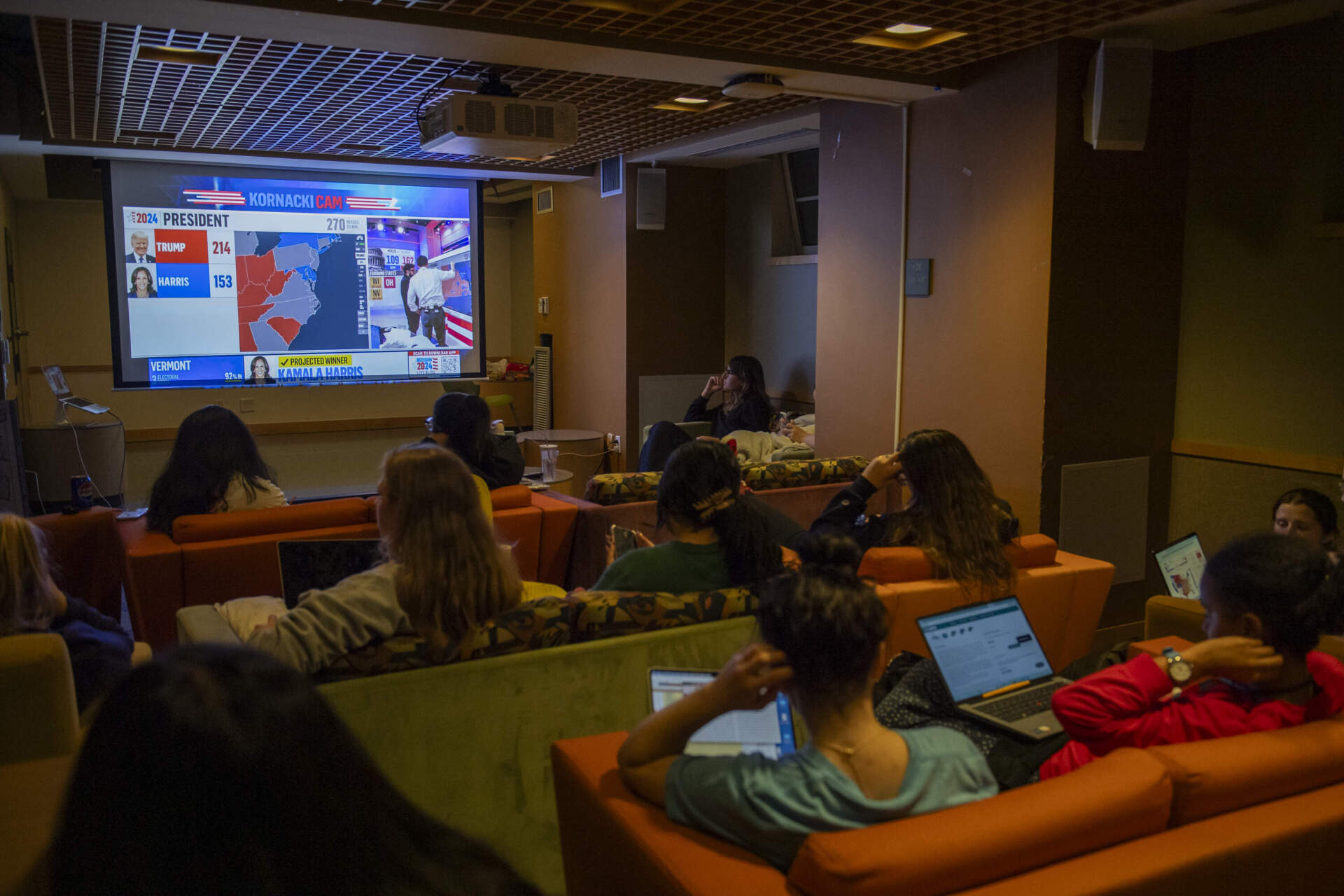 Simmons students watch election projections during a watch party. (Amanda Sabga for WBUR)