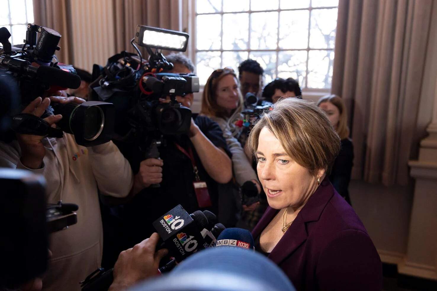 Gov. Maura Healey speaks with reporters at Newton City Hall on Nov. 25, 2024. (Chris Lisinski/SHNS)