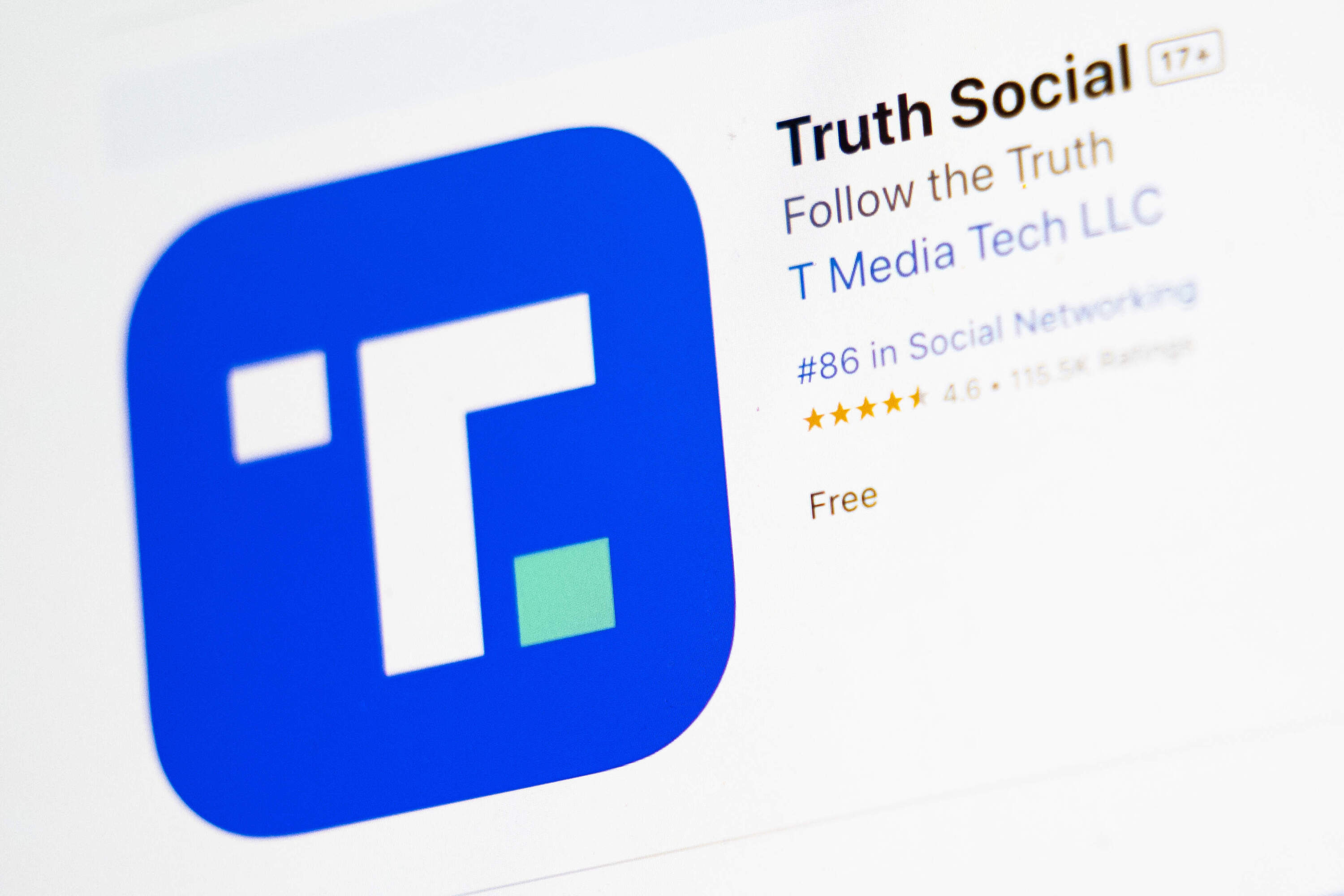 The download screen for Truth Social app is seen on a laptop computer. (John Minchillo/AP)