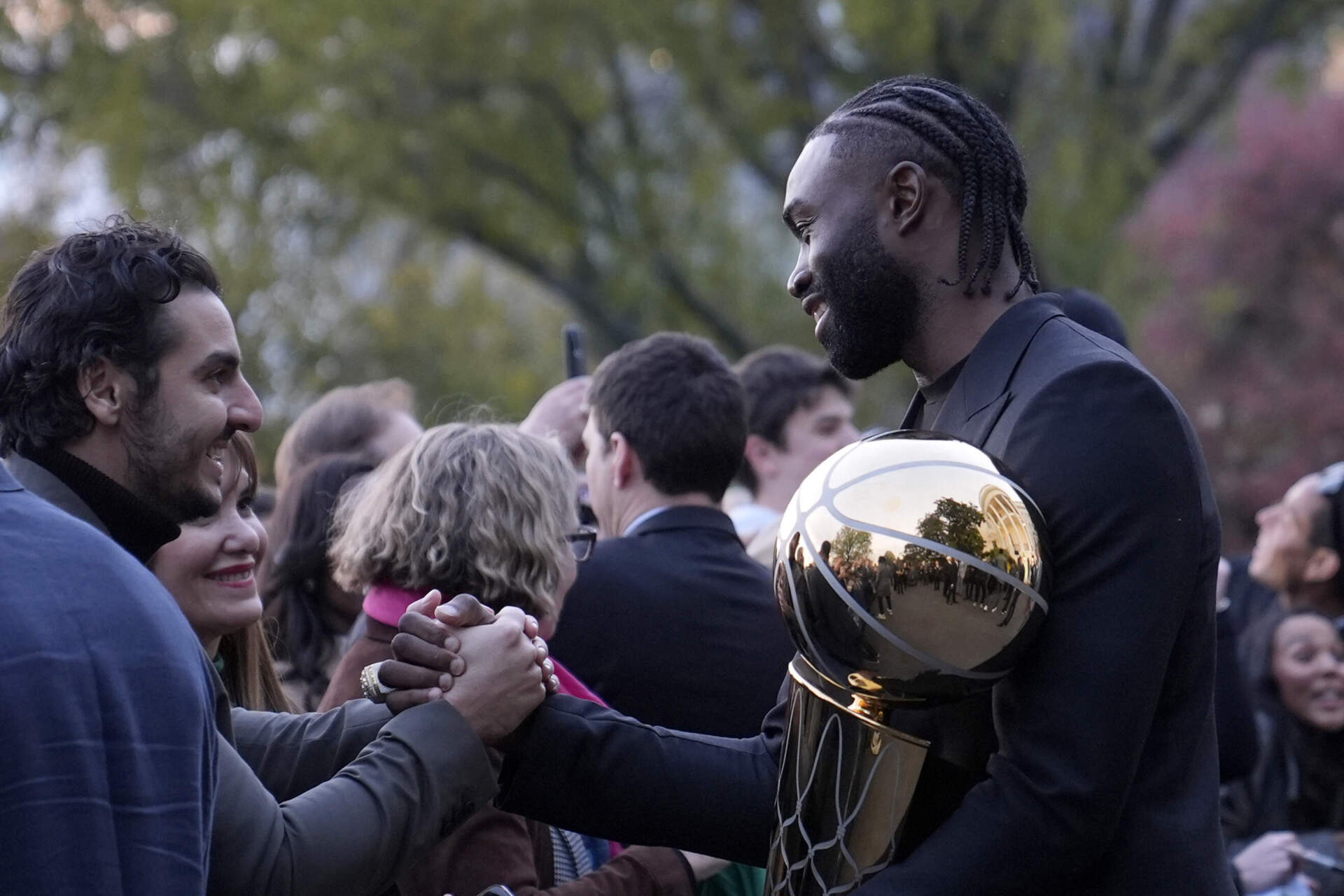 Boston Celtics Jaylen Brown talk with people following an event with President Joe Biden. (Susan Walsh/AP)