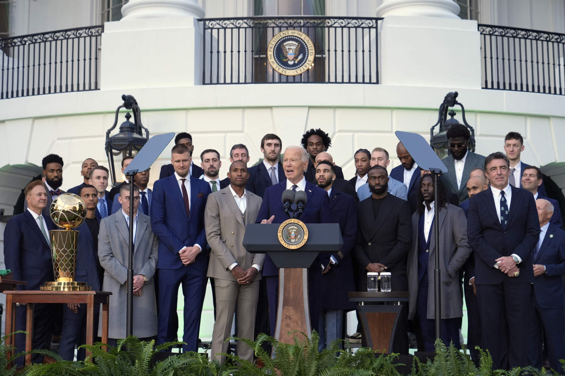 President Joe Biden, center, speaks during an event to welcome the Boston Celtics and celebrate their victory in the 2024 NBA Championship, on the South Lawn of the White House. (Susan Walsh/AP)