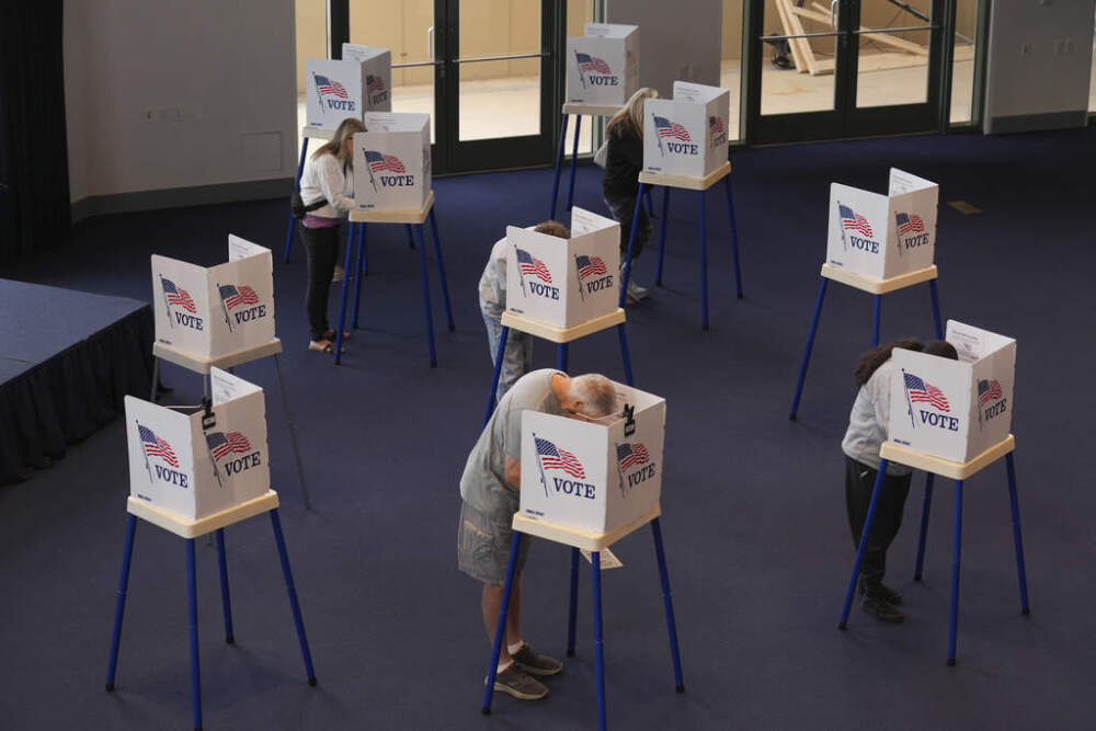 Voters work on their ballots at a polling place at the Ronald Reagan Presidential Library on Election Day, Tuesday, Nov. 5, 2024, in Simi Valley, Calif. (AP Photo/Chris Pizzello)