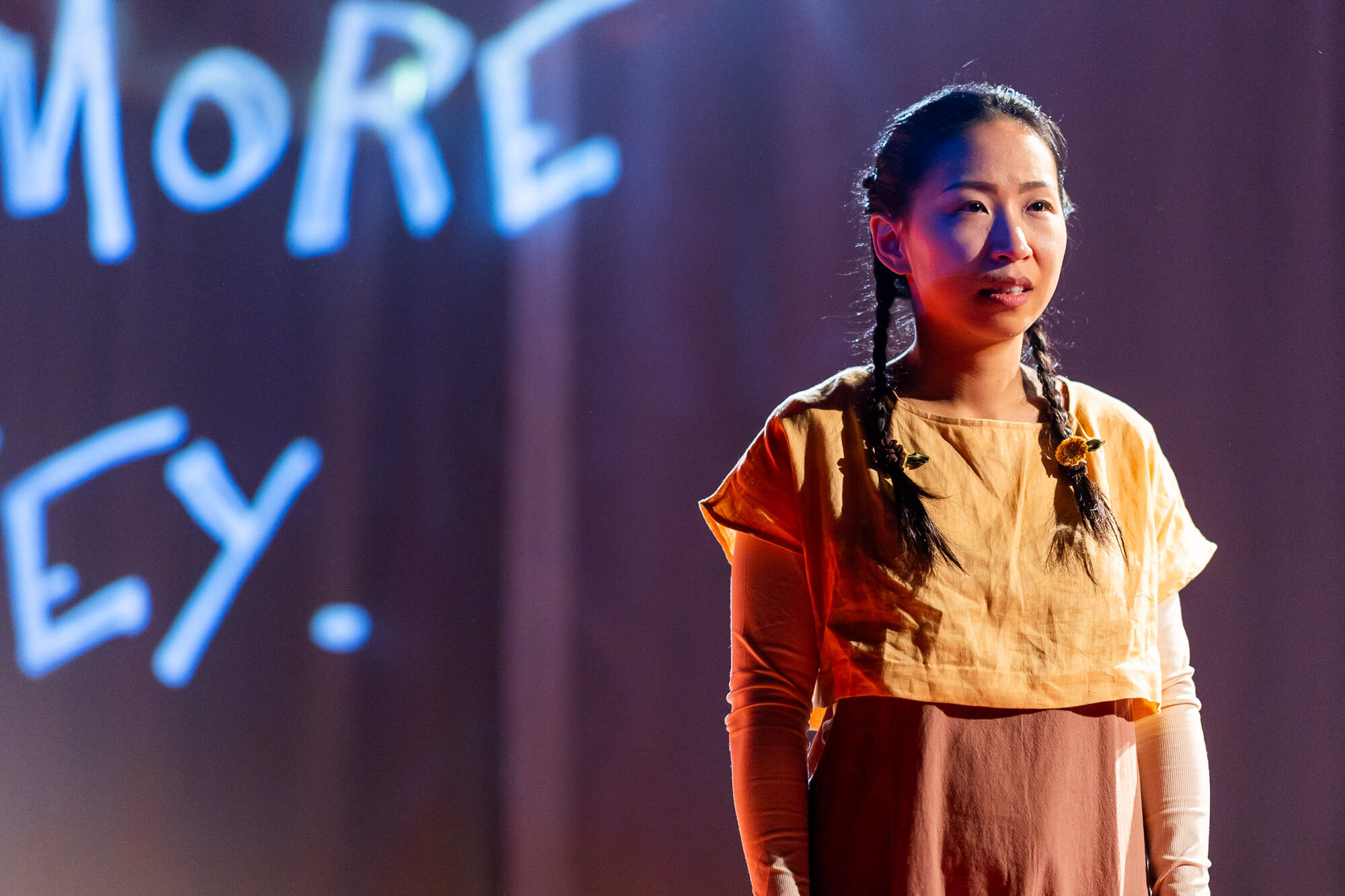Zoë Kim during a performance of her show “Did You Eat? (밥 먹었니?).” (Courtesy Maggie Hall)