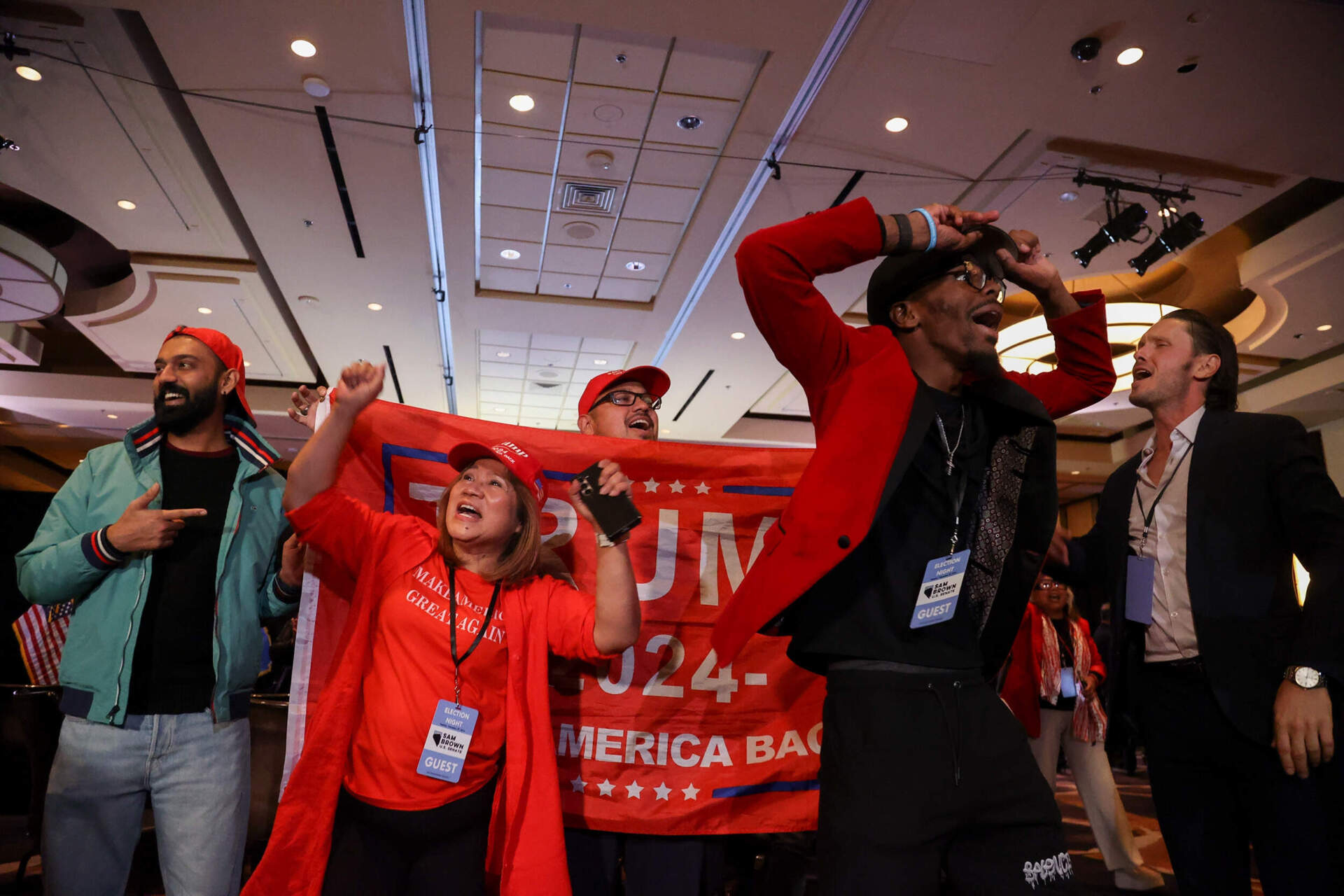 Supporters of Trump cheer as Pennsylvania votes are counted, during an election night watch party in Las Vegas, Nev. (Ian Maule/AP)