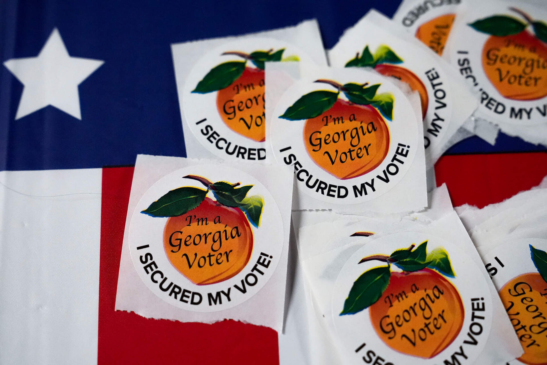 Stickers sit on a table inside a polling place, Tuesday, Nov. 5, 2024, in Atlanta, Ga. (Brynn Anderson/AP)