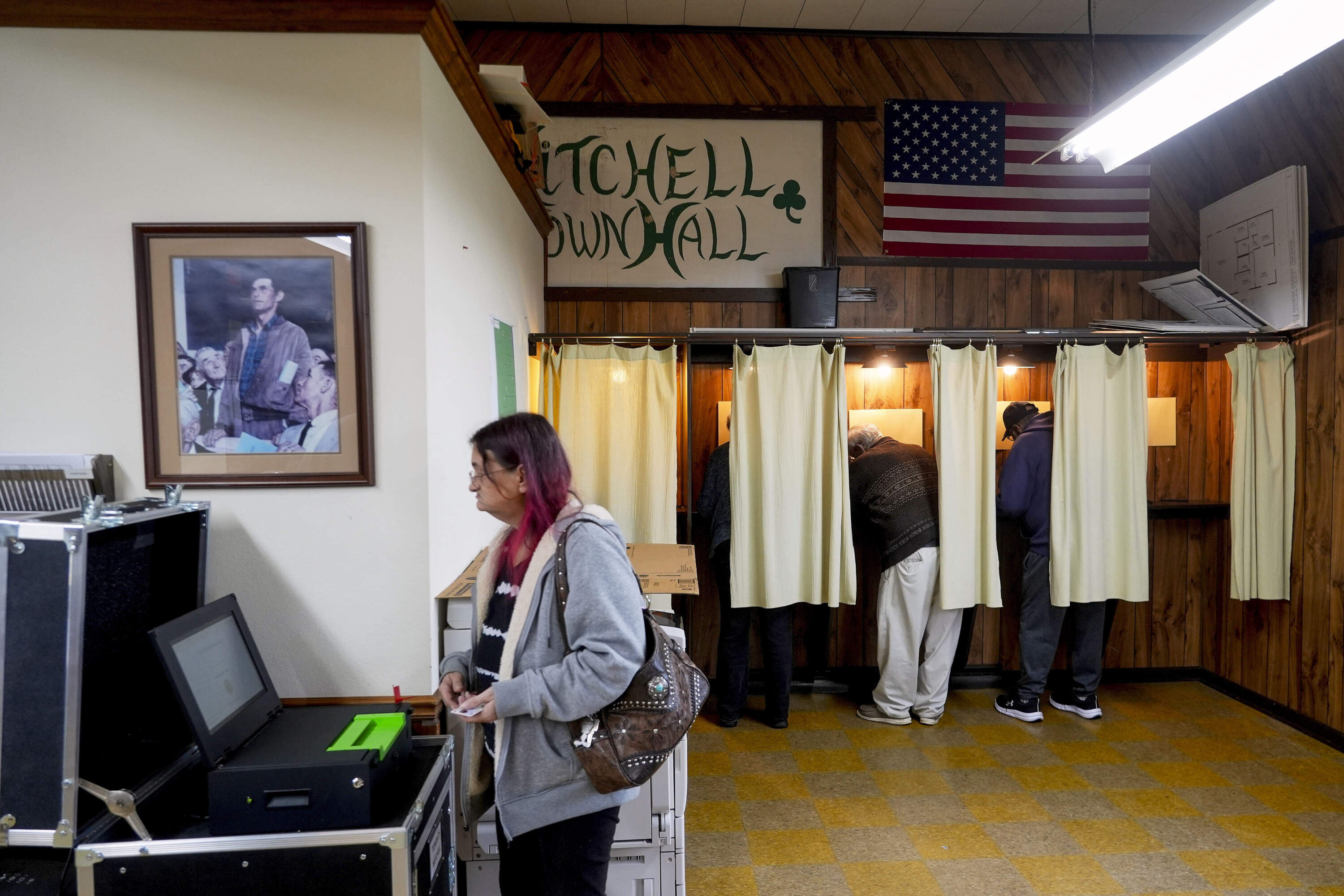 A woman casts her ballot at a polling place in Mitchell, Wis. (Morry Gash/AP)