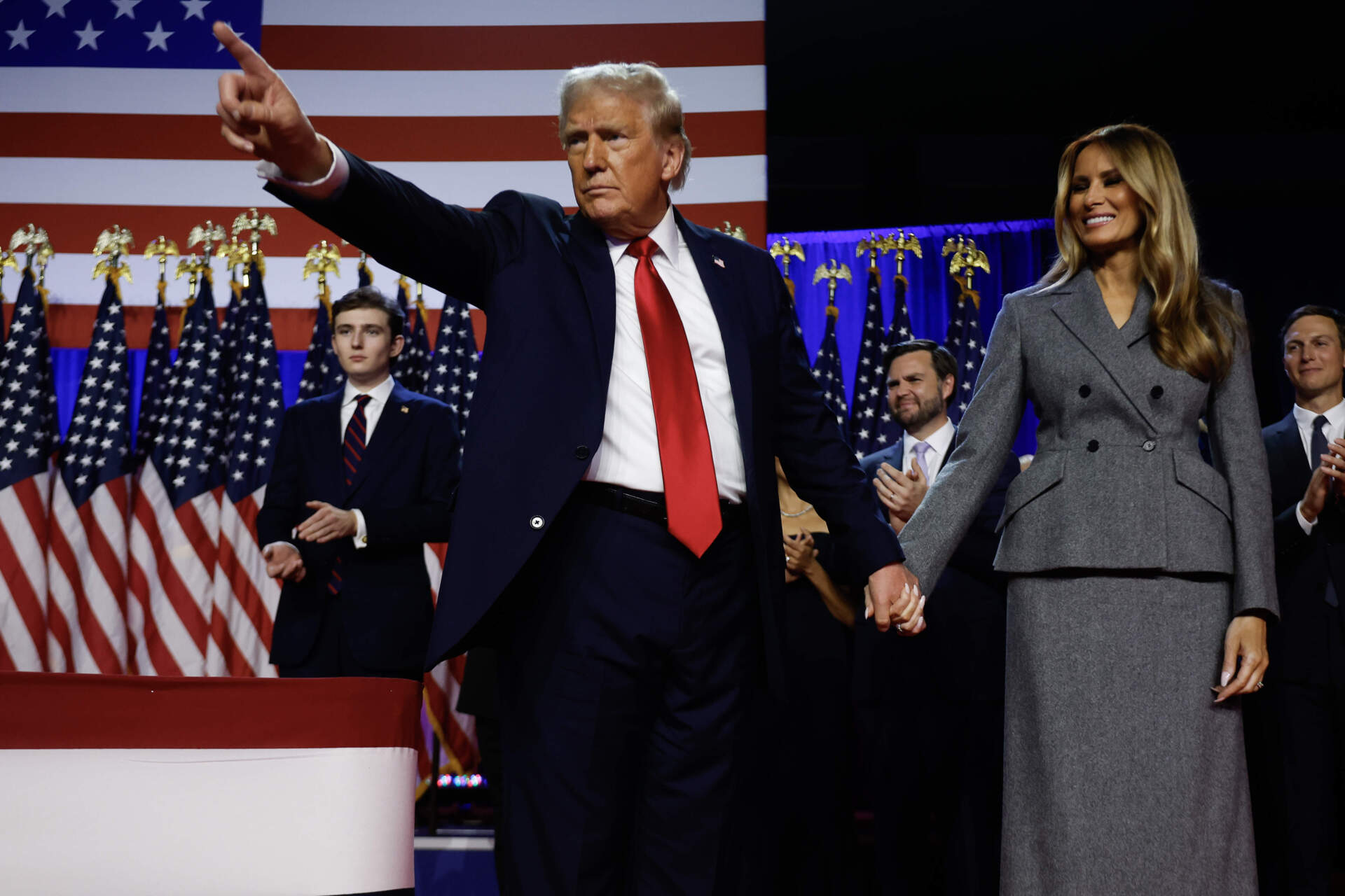 President-elect Trump points to supporters with former first lady Melania Trump during an election night event at the Palm Beach Convention Center on Nov. 6, 2024 in West Palm Beach, Fla. (Chip Somodevilla/Getty Images)