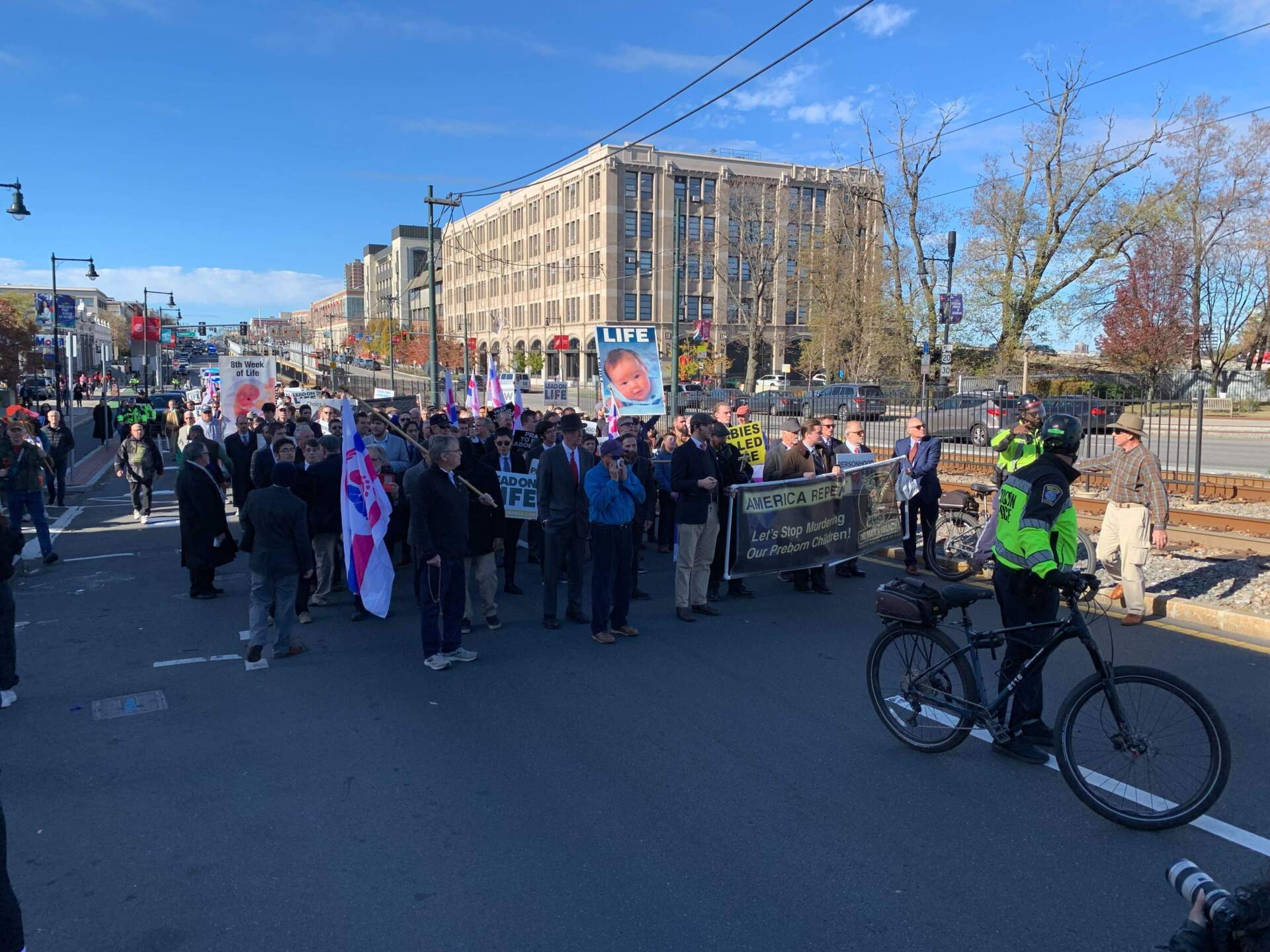 Anti-abortion protesters march down Commonwealth Ave. (Robin Lubbock/WBUR)