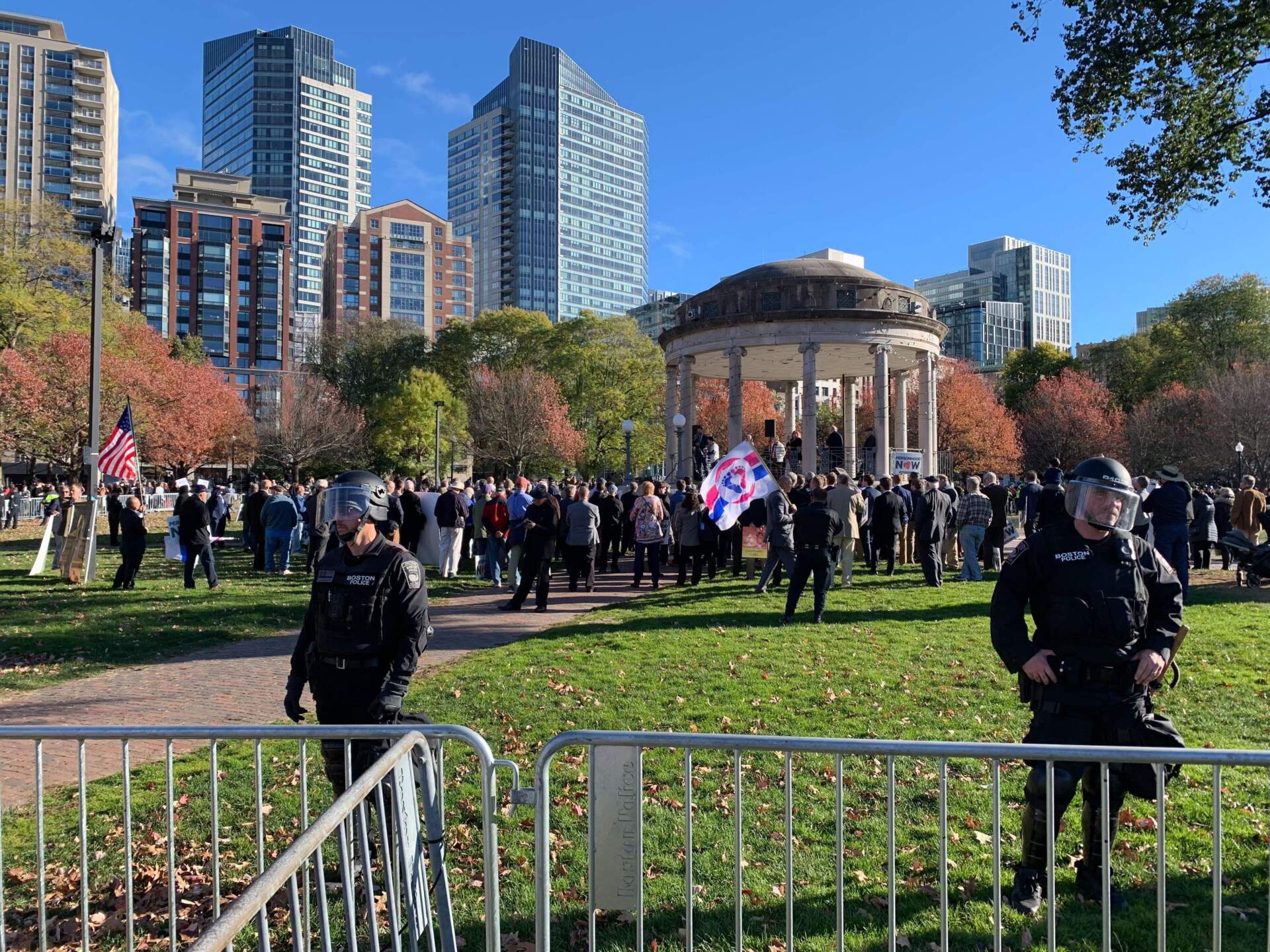 Barricades and police separate the anti-abortion "men's march" and counter-protesters. (Robin Lubbock/WBUR)
