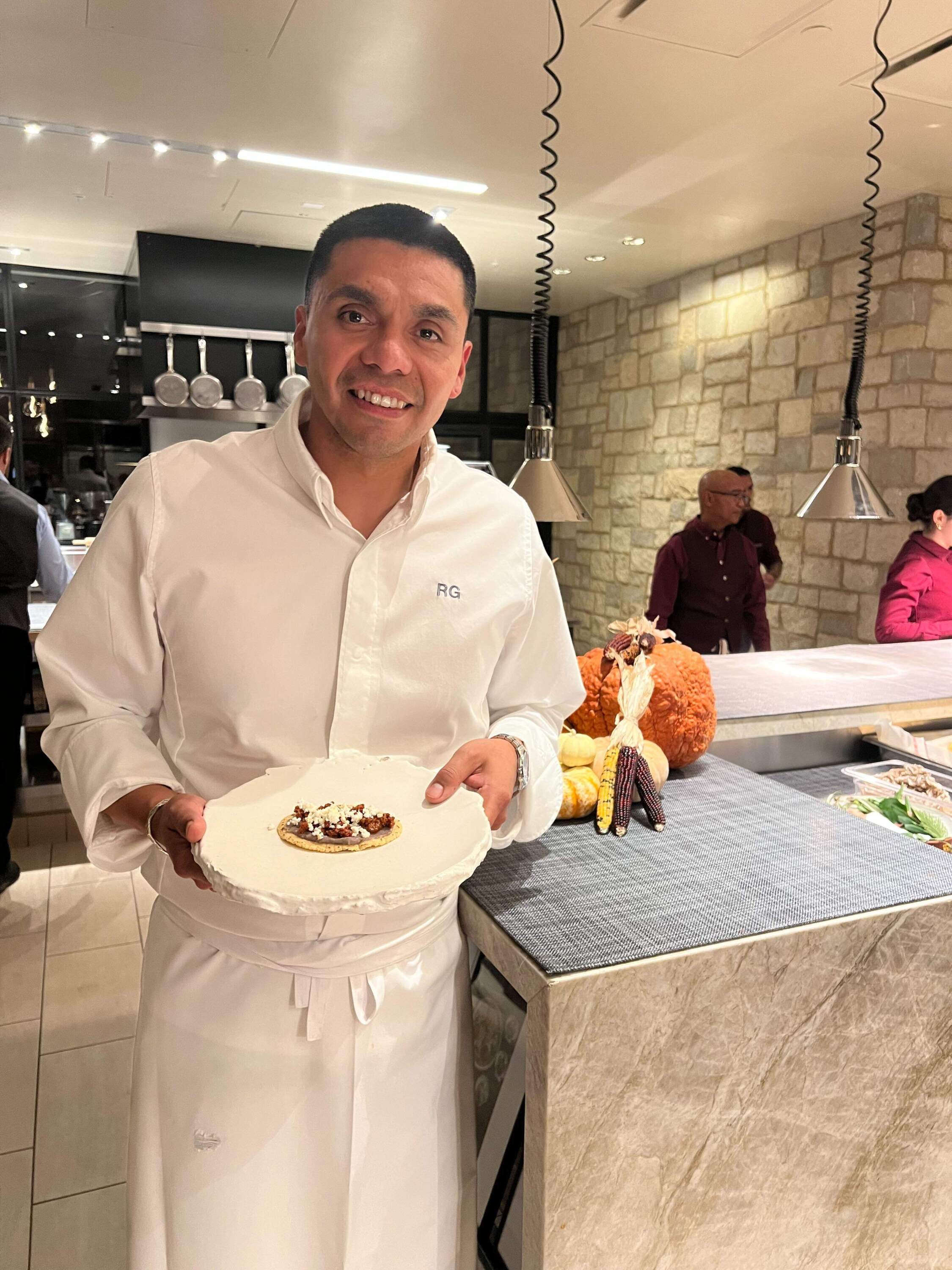 Chef Rogelio Garcia prepares food at Auro restaurant. (Deepa Fernandes/Here & Now)