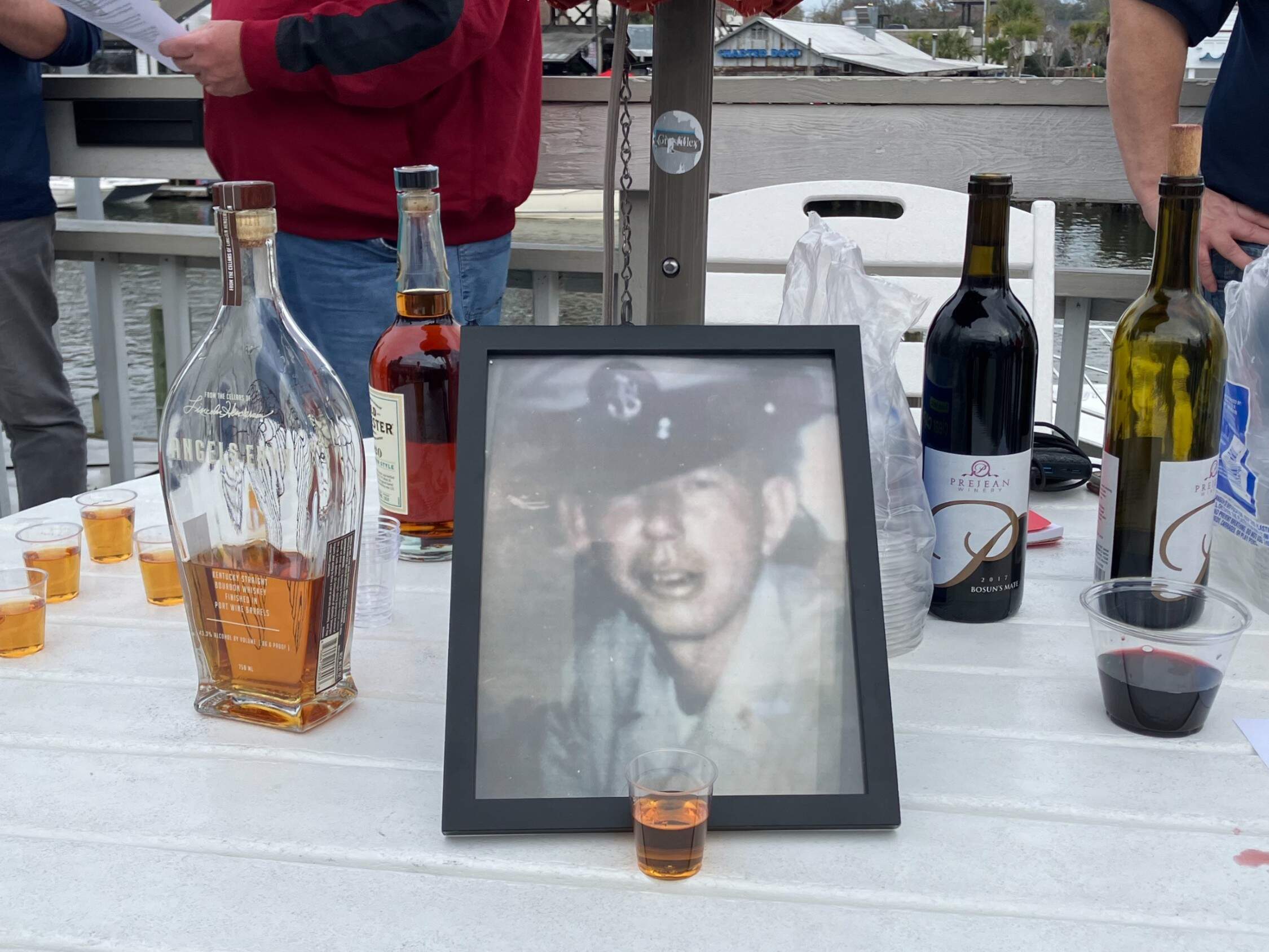 The author and her shipmates honored their ship’s namesake, Chief Petty Officer Quincy Truett, who served in Vietnam, during their reunion earlier this year. (Courtesy Laura McTaggart)
