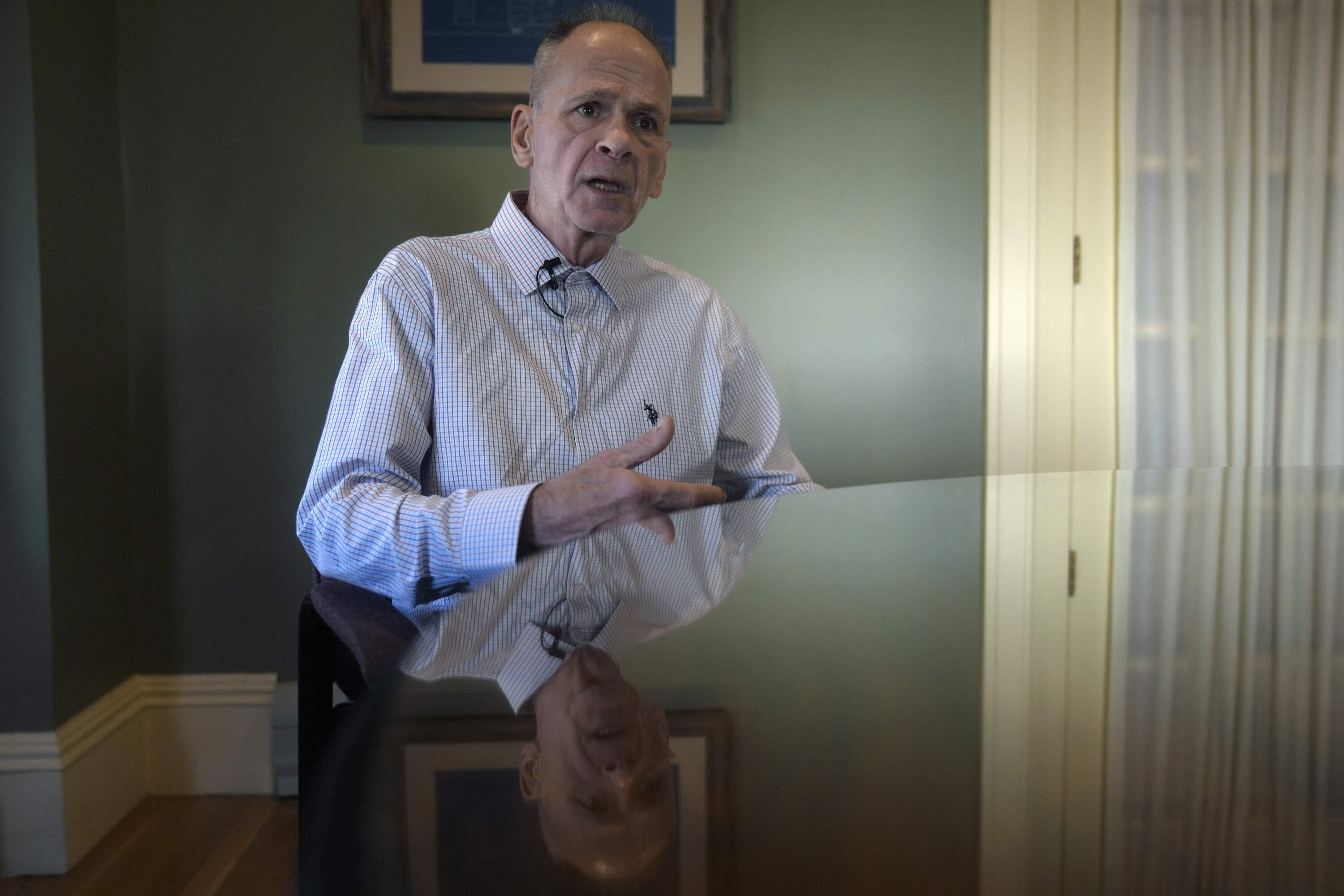 Michael Sullivan speaks to a reporter from The Associated Press at his attorney's office in Framingham, Mass. (Steven Senne/AP)