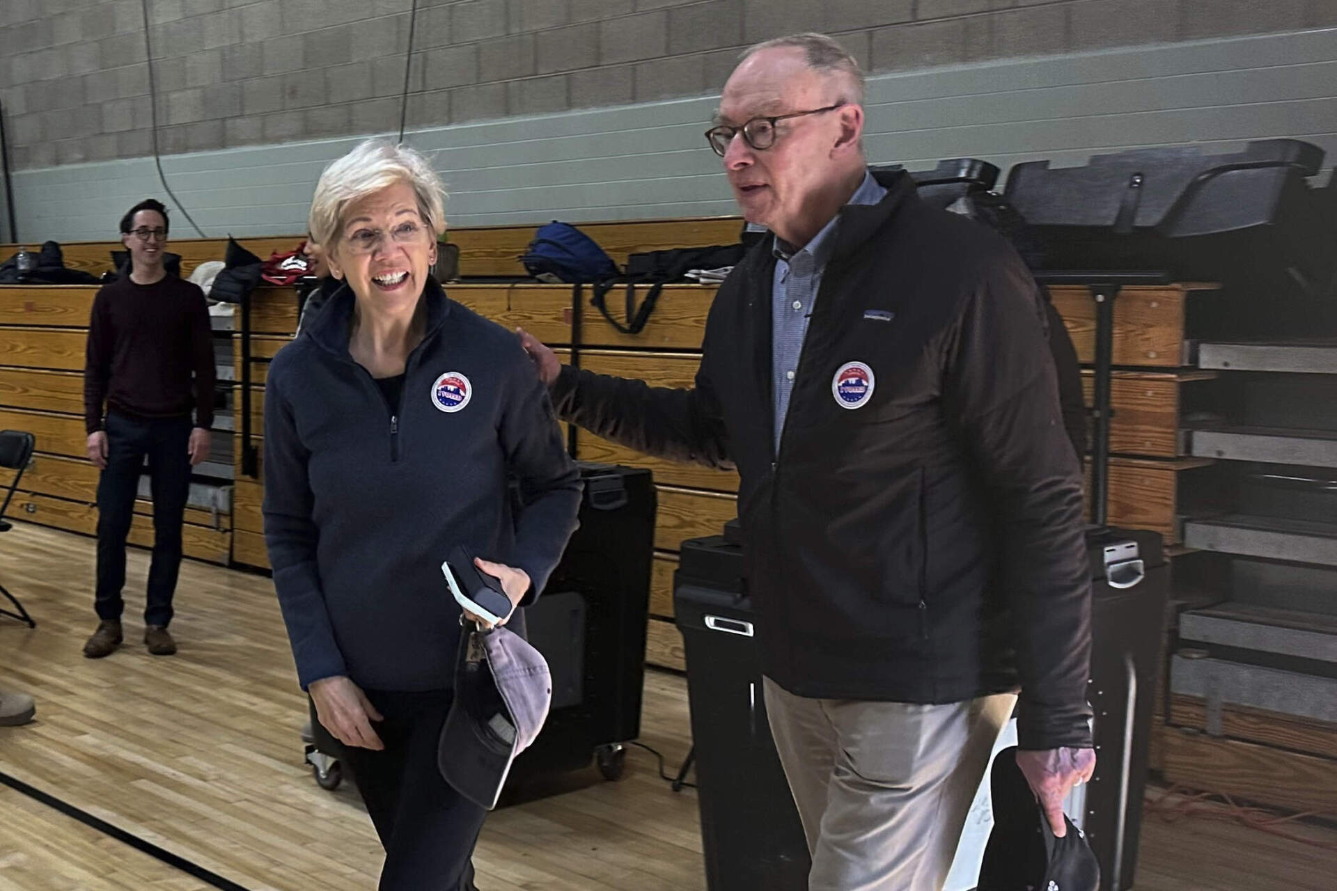 U.S. Sen. Elizabeth Warren and her husband Bruce Mann cast their ballots at a polling location near her home in Cambridge, Mass. on Election Day 2024. (Steve LeBlanc/AP)