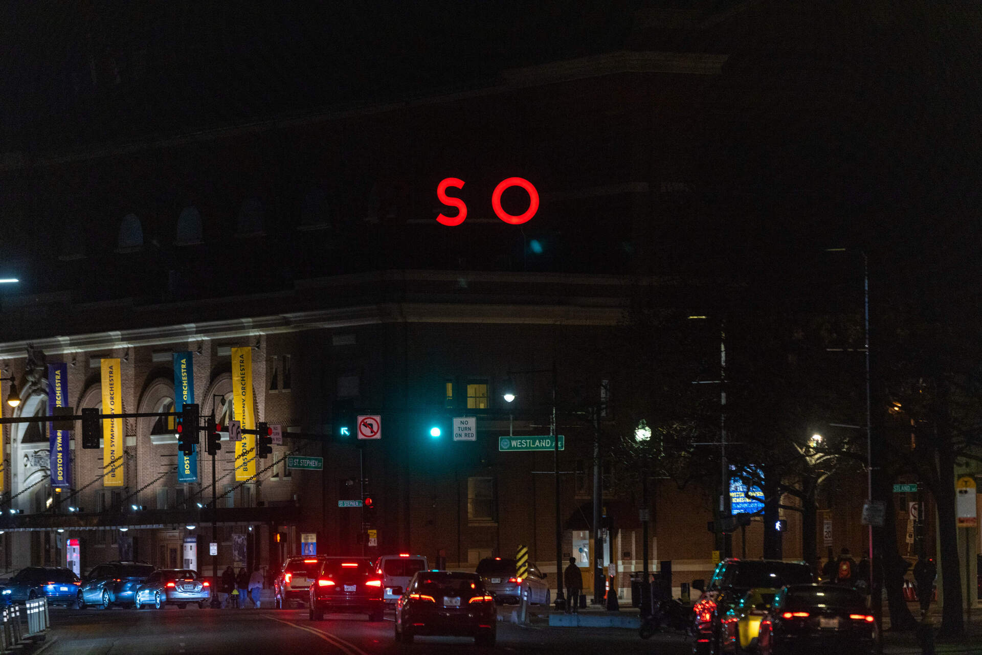 Outside of Symphony Hall, the B in the BSO sign is turned off to illuminate only the SO, the initials of Seiji Ozawa, to honor him the day his death was announced.