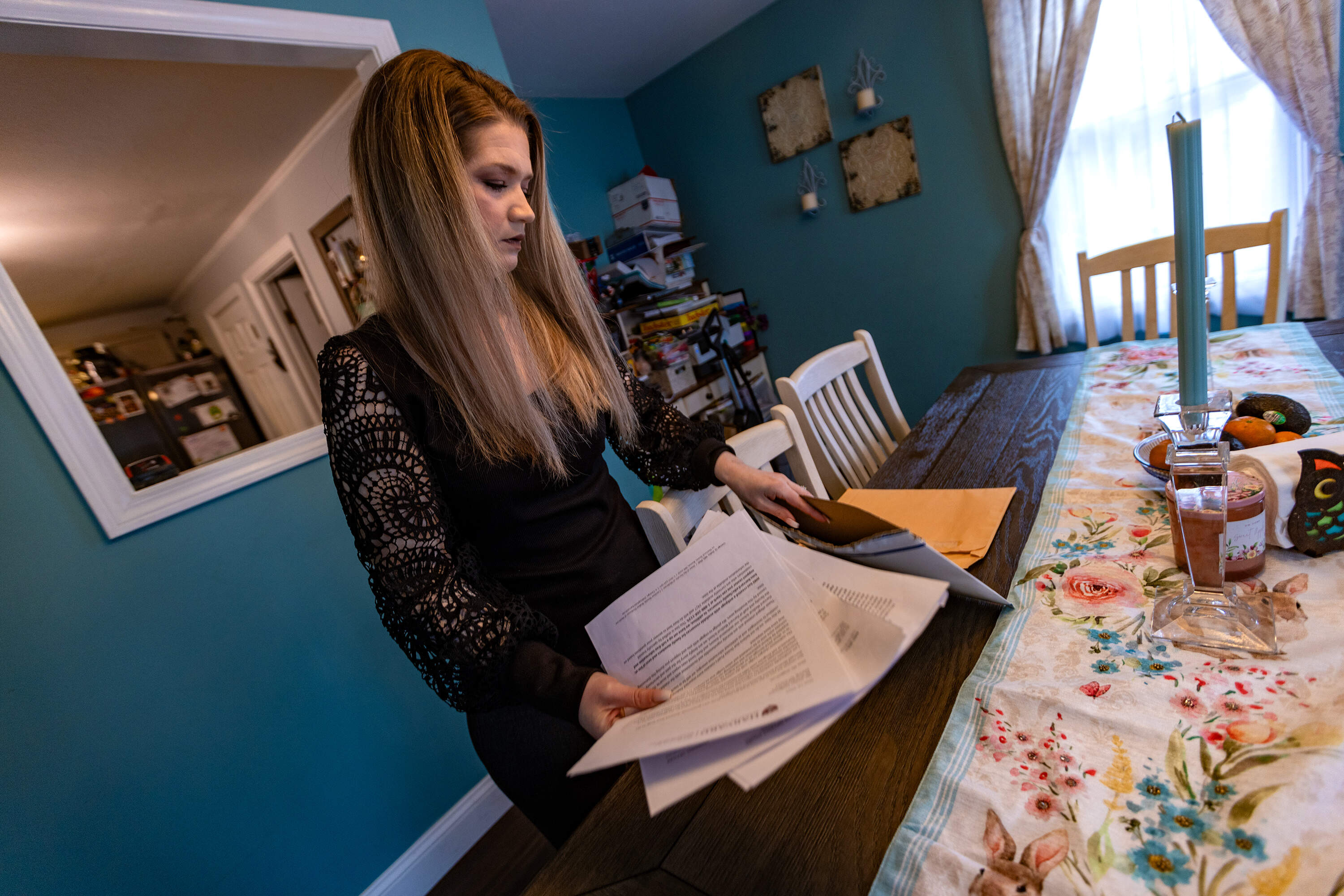 Amber Haggstrom files through all of the legal documents related to the Harvard morgue scandal.
