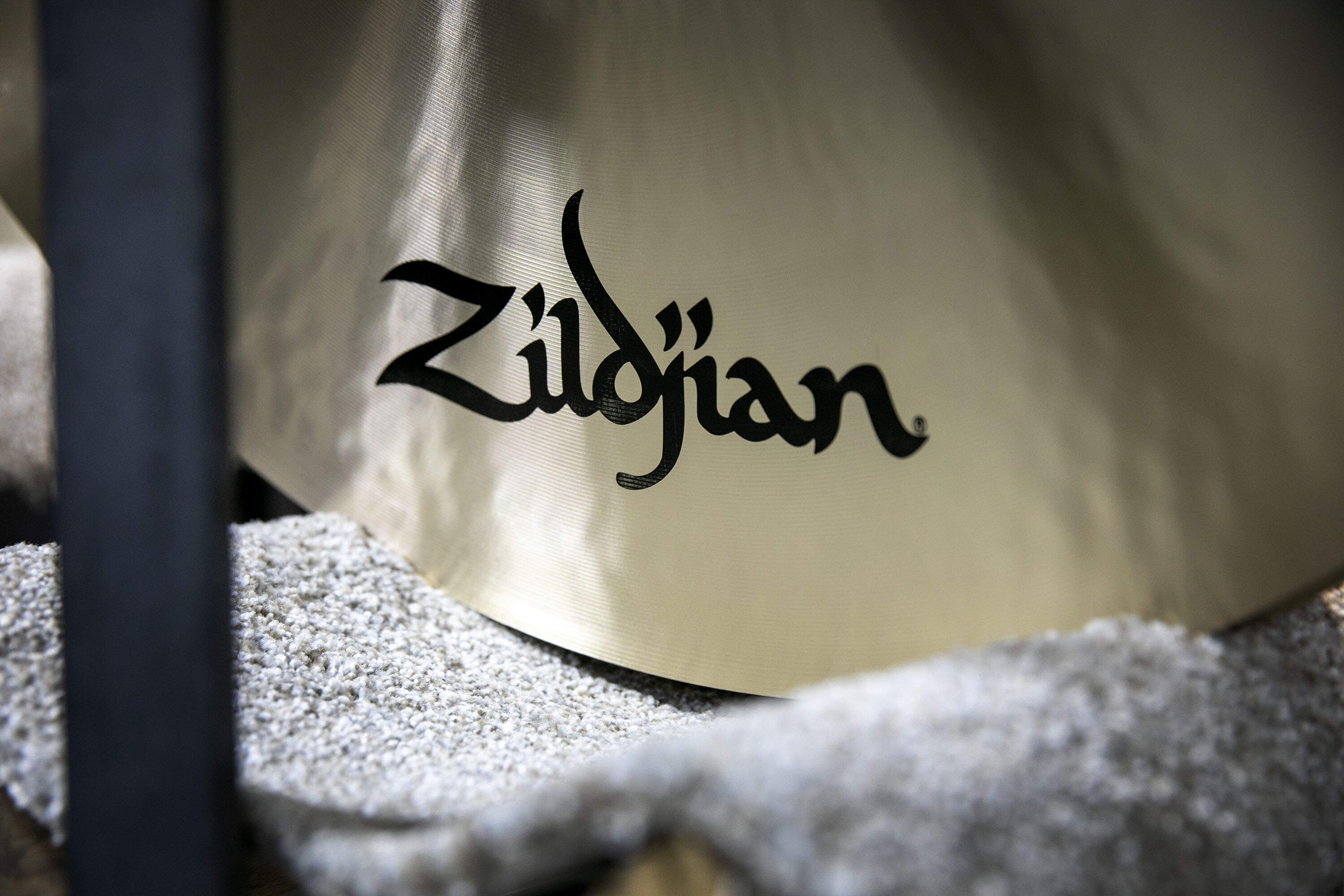 A cymbal printed with the Zildjian trademark. (Robin Lubbock/WBUR)