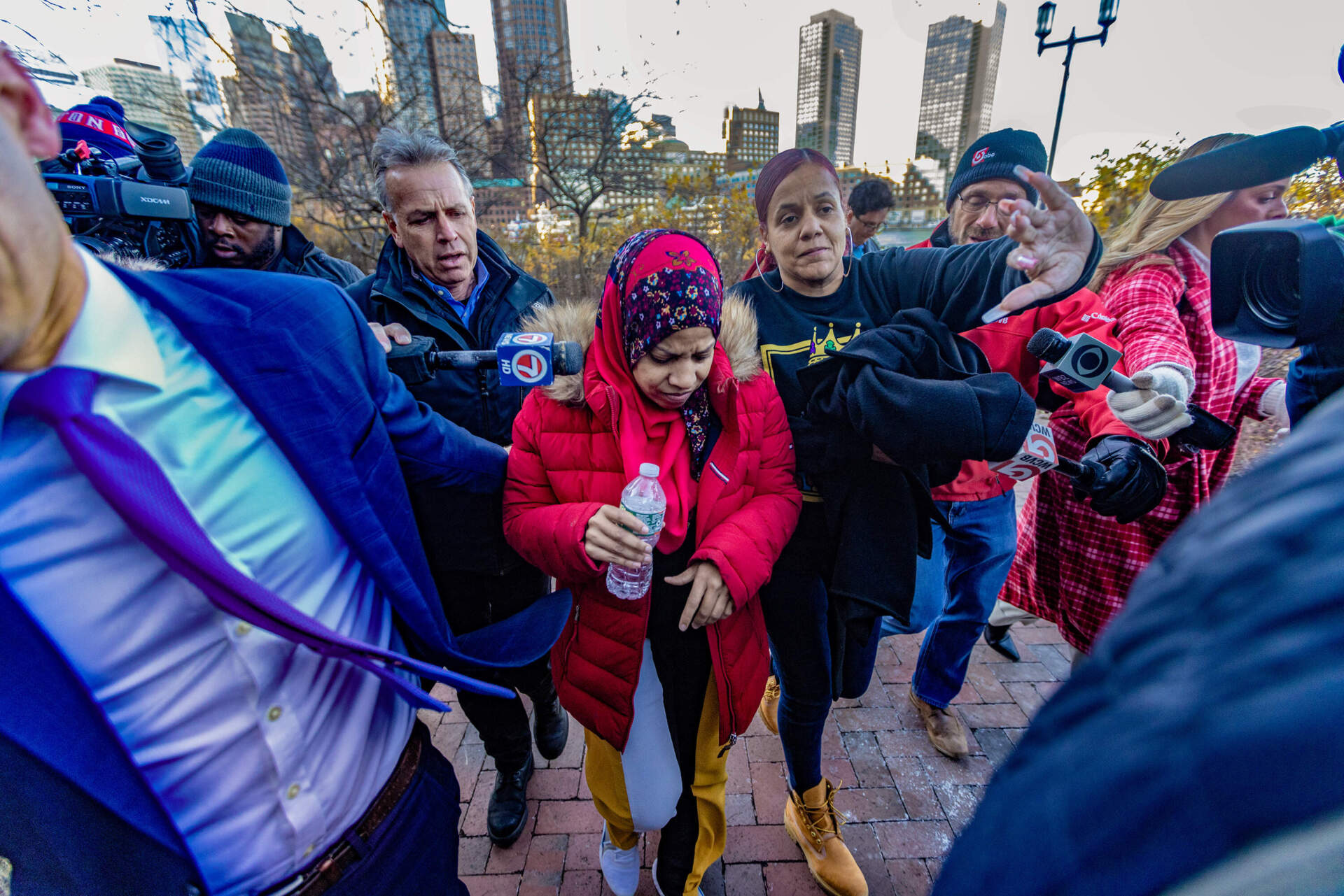 Tania Fernandes Anderson walking away after being arraigned at Moakley Federal Courthouse on public corruption charges.