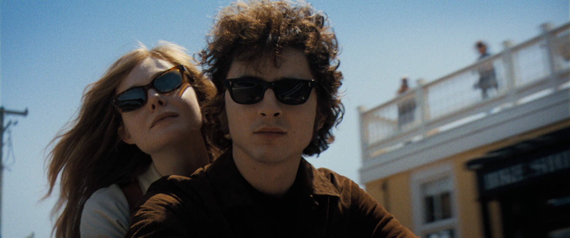 Elle Fanning and Timothée Chalamet in "A Complete Unknown." (Courtesy Searchlight Pictures)