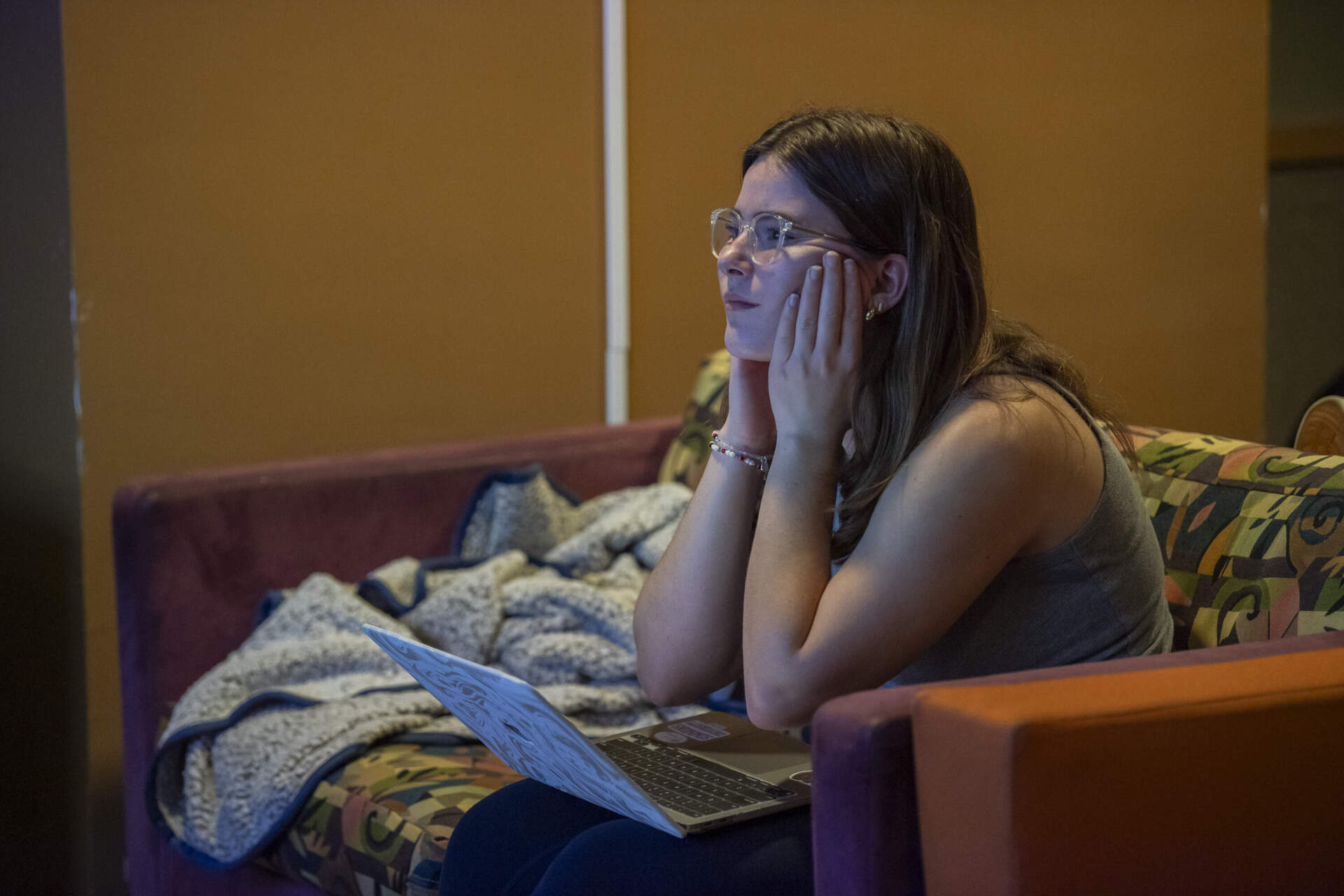 Simmons University student Bella Santos reacts to election projections during an Election Day watch party at Simmons University, hosted by several student groups on Tuesday, November 5, 2024.