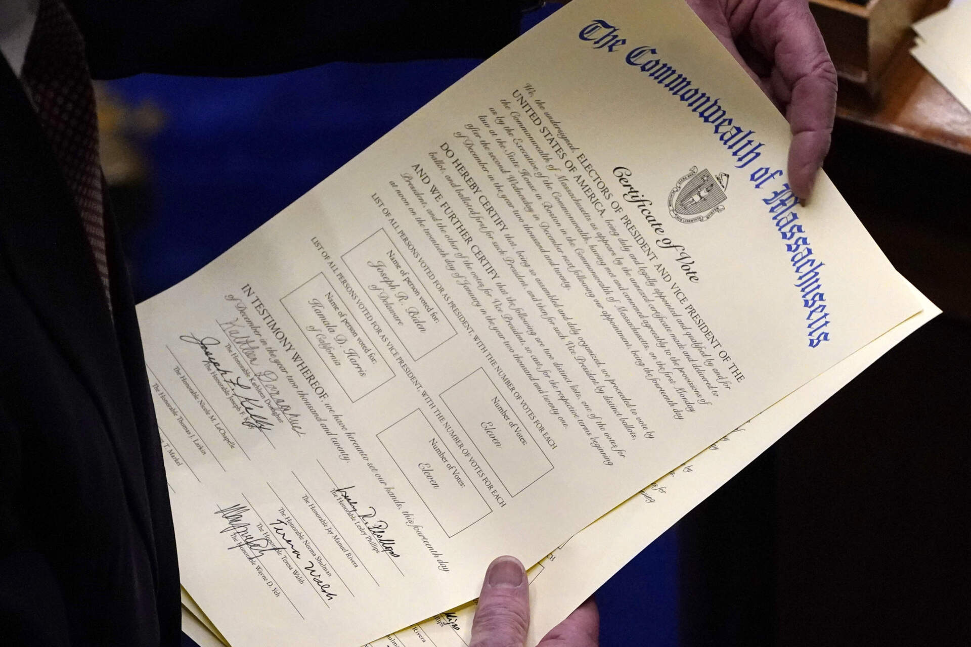 Galvin collects a signed Certificate of Vote from an elector in 2020. (Charles Krupa/AP)