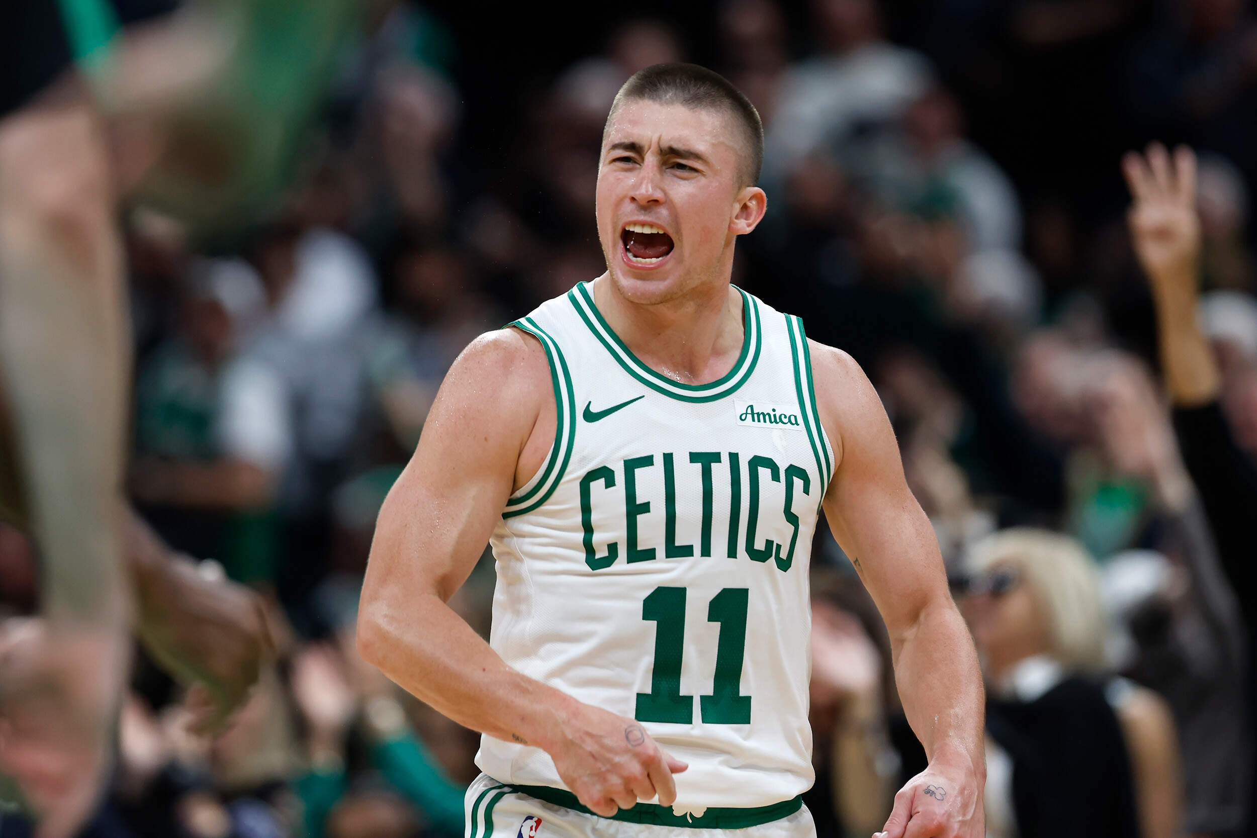Boston Celtics' Payton Pritchard reacts after making a three-pointer during the second half of an NBA basketball game against the Milwaukee Bucks, Monday in Boston. (Michael Dwyer/AP)