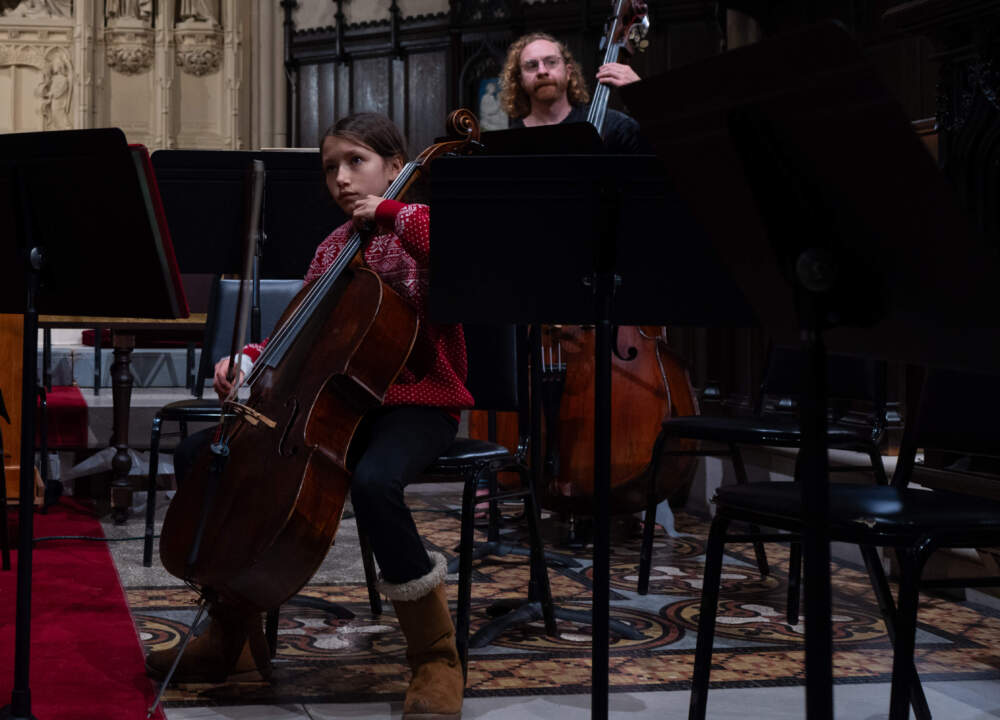 A Project STEP musician looks at the conductor while practicing. (Sydney Ko/WBUR)