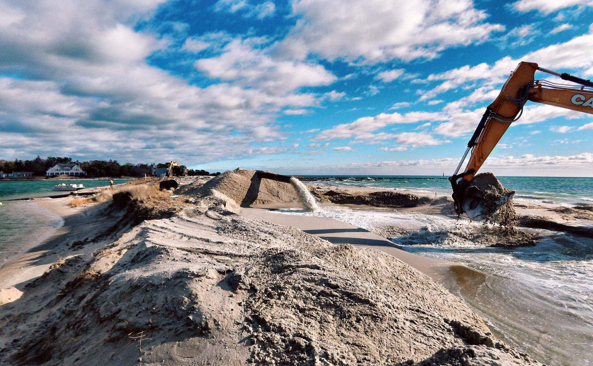 A dredger at work removing sand from one end of Sampsons Island as part of their 2018-2021 beach nourishment project. (Courtesy of Sonja Sheasley, Barnstable County)