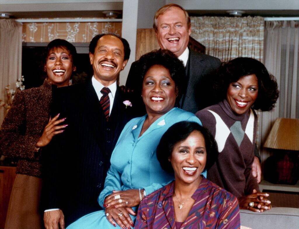 The cast of the TV sitcom "The Jeffersons" circa 1977. The Front Porch Arts Collective is staging holiday scenes from beloved Black sitcoms. (Photo by Michael Ochs Archives/Getty Images)