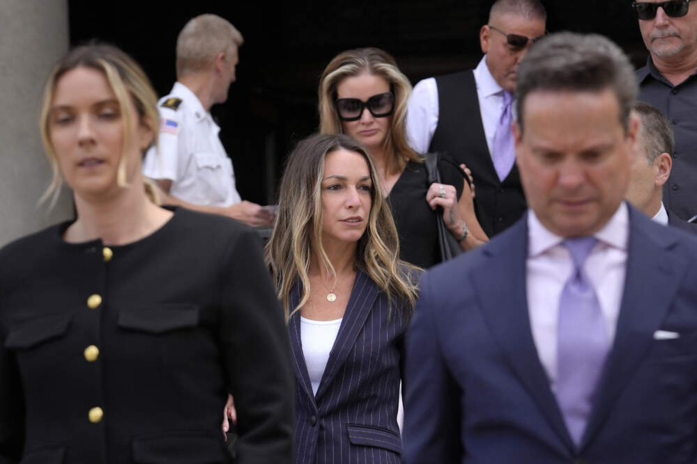 Karen Read, center, departs Norfolk Superior Court, Wednesday, June 26, 2024, in Dedham, Mass. (Steven Senne/AP)