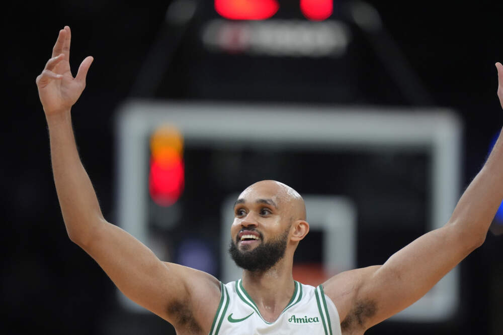 Boston Celtics guard Derrick White celebrates after his team scored a 3-point basket in the first half of an NBA basketball game against the Minnesota Timberwolves, Sunday, Nov. 24, 2024, in Boston. (Steven Senne/AP)