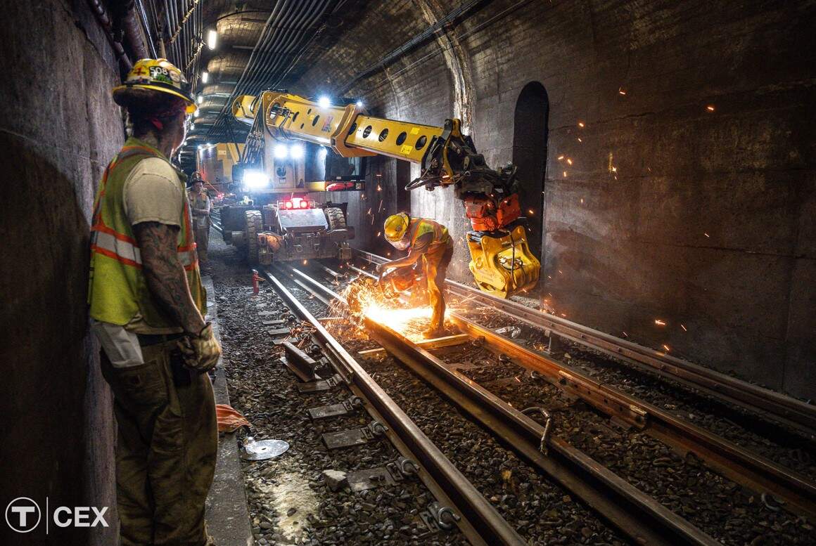 Crews perform track work on the Red Line. (MBTA Customer and Employee Experience Department)