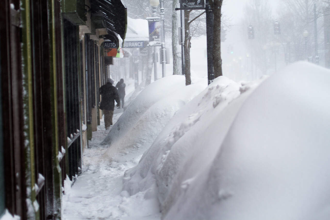 The snowbanks along Market Street in Lynn, Mass., made sidewalks tough to navigate on Feb. 2, 2015. (Jesse Costa/WBUR)