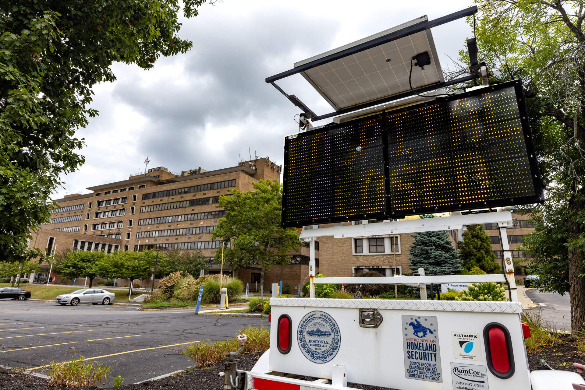 A sign outside Carney Hospital on Sept 1, 2024, alerts the public the facility is closed. (Jesse Costa/WBUR)